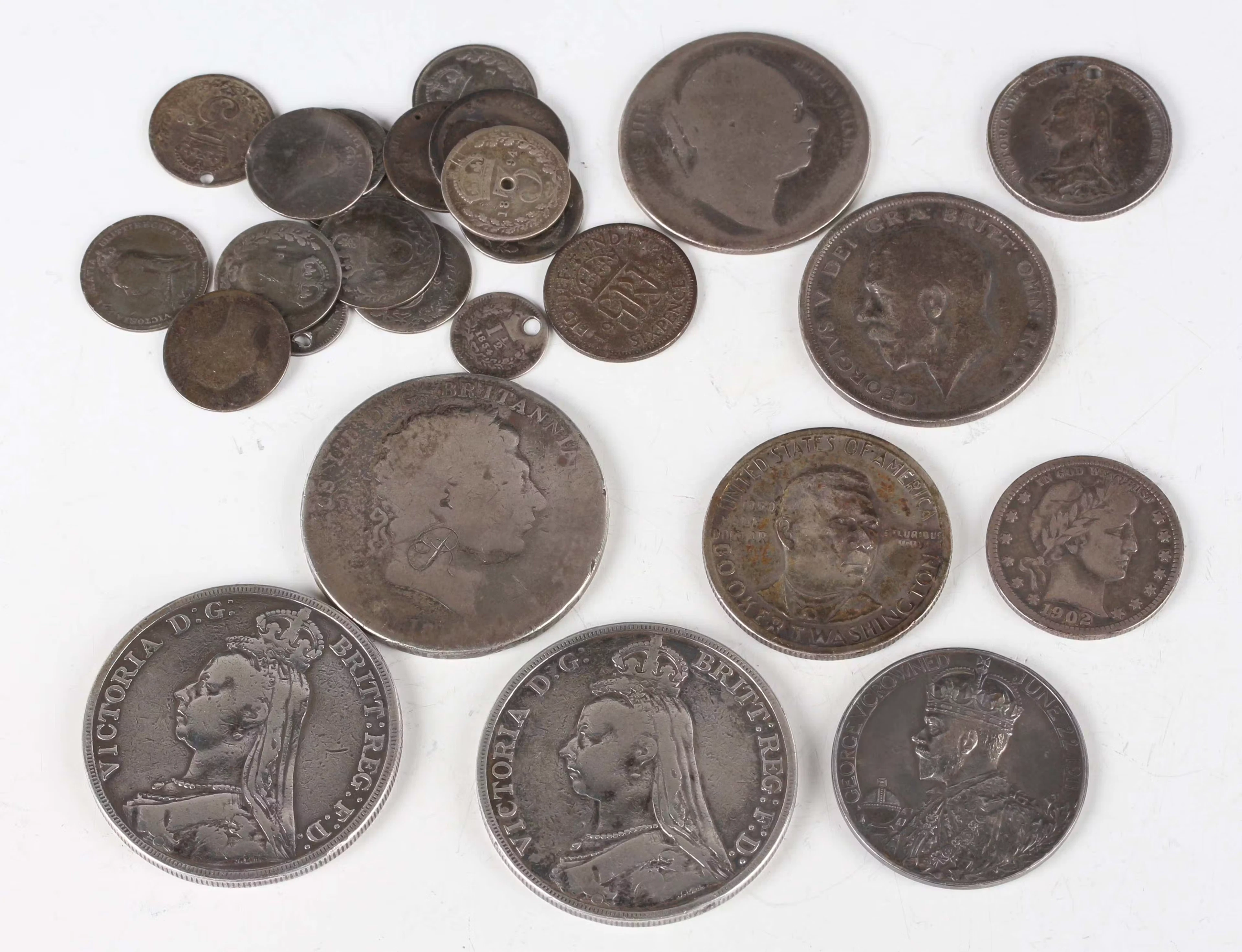 A small collection of 19th and 20th century silver and silver nickel