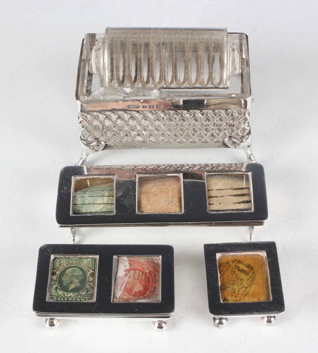 An Edwardian silver triple-section stamp box, the hinged lid with