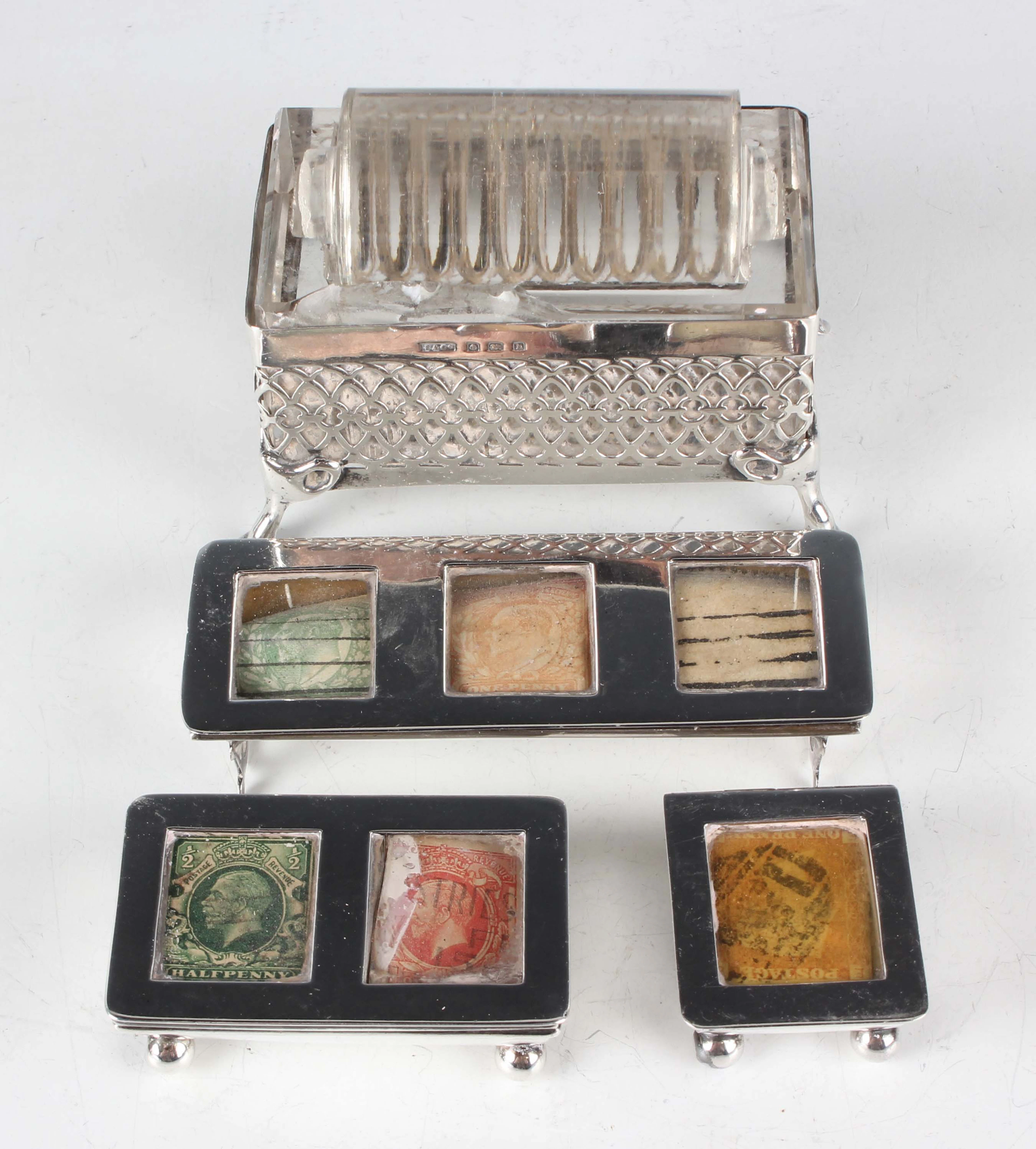An Edwardian silver triple-section stamp box, the hinged lid with