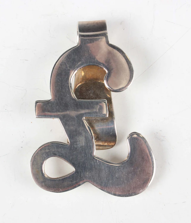 A .925 silver money clip in the form of a pound sign, weight 17.6g