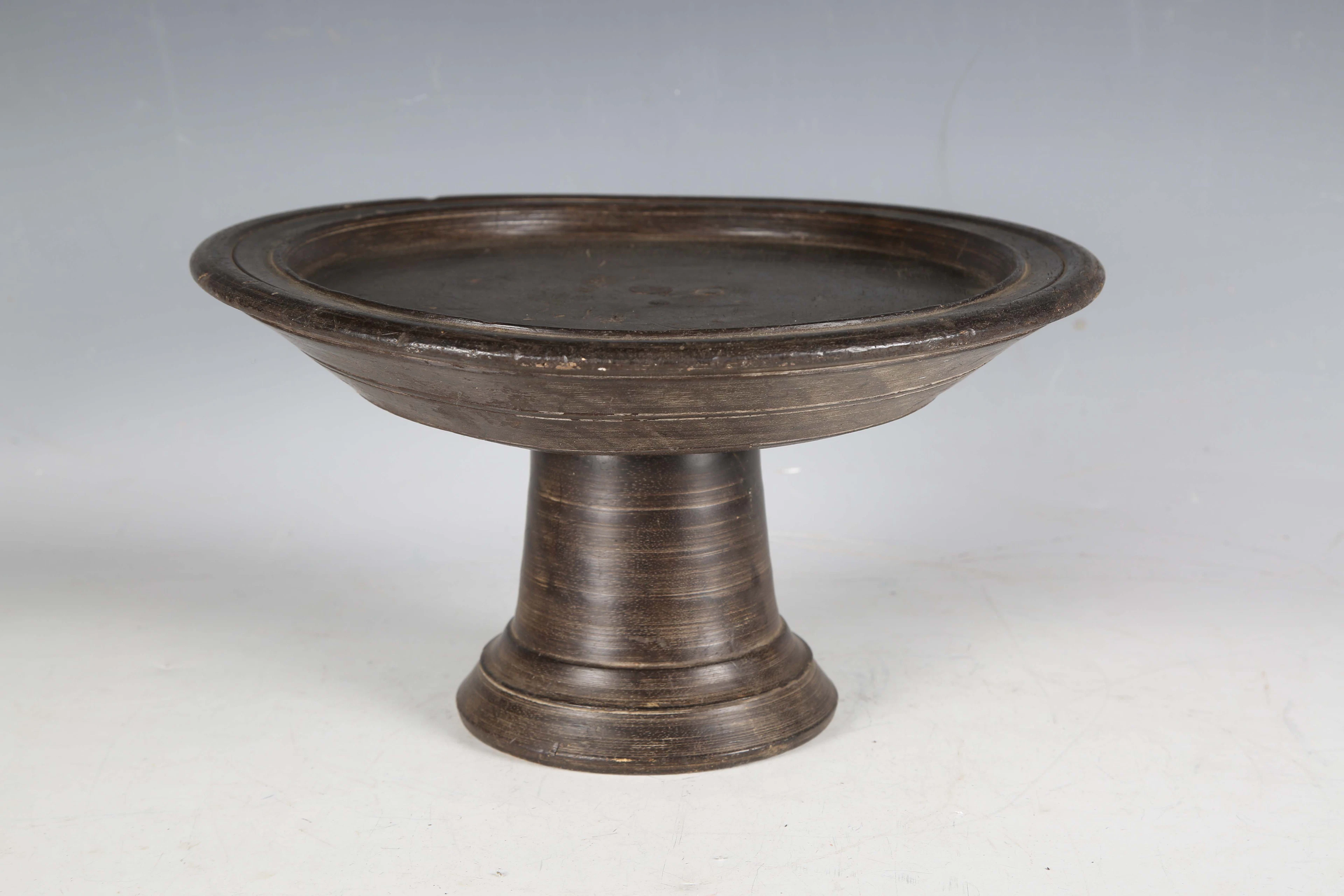 An 18th century turned softwood serving tazza with a raised tapering