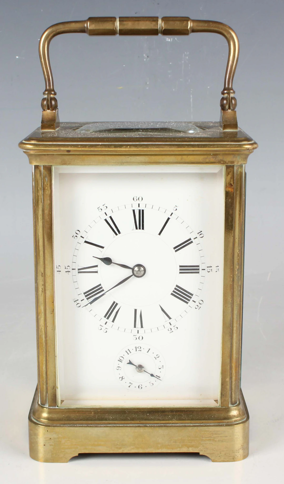 A late 19th/early 20th century French brass corniche cased carriage