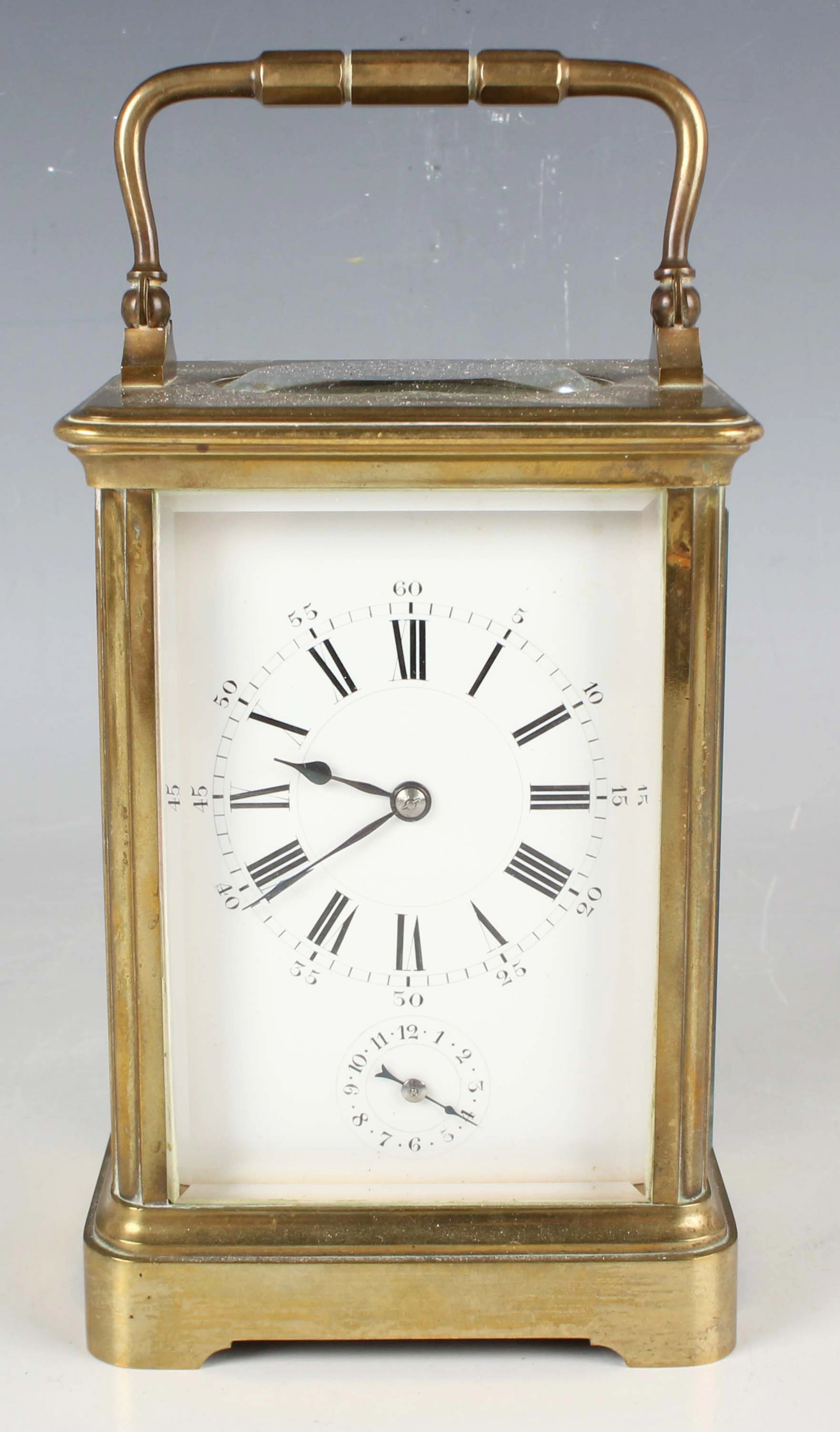 A late 19th/early 20th century French brass corniche cased carriage
