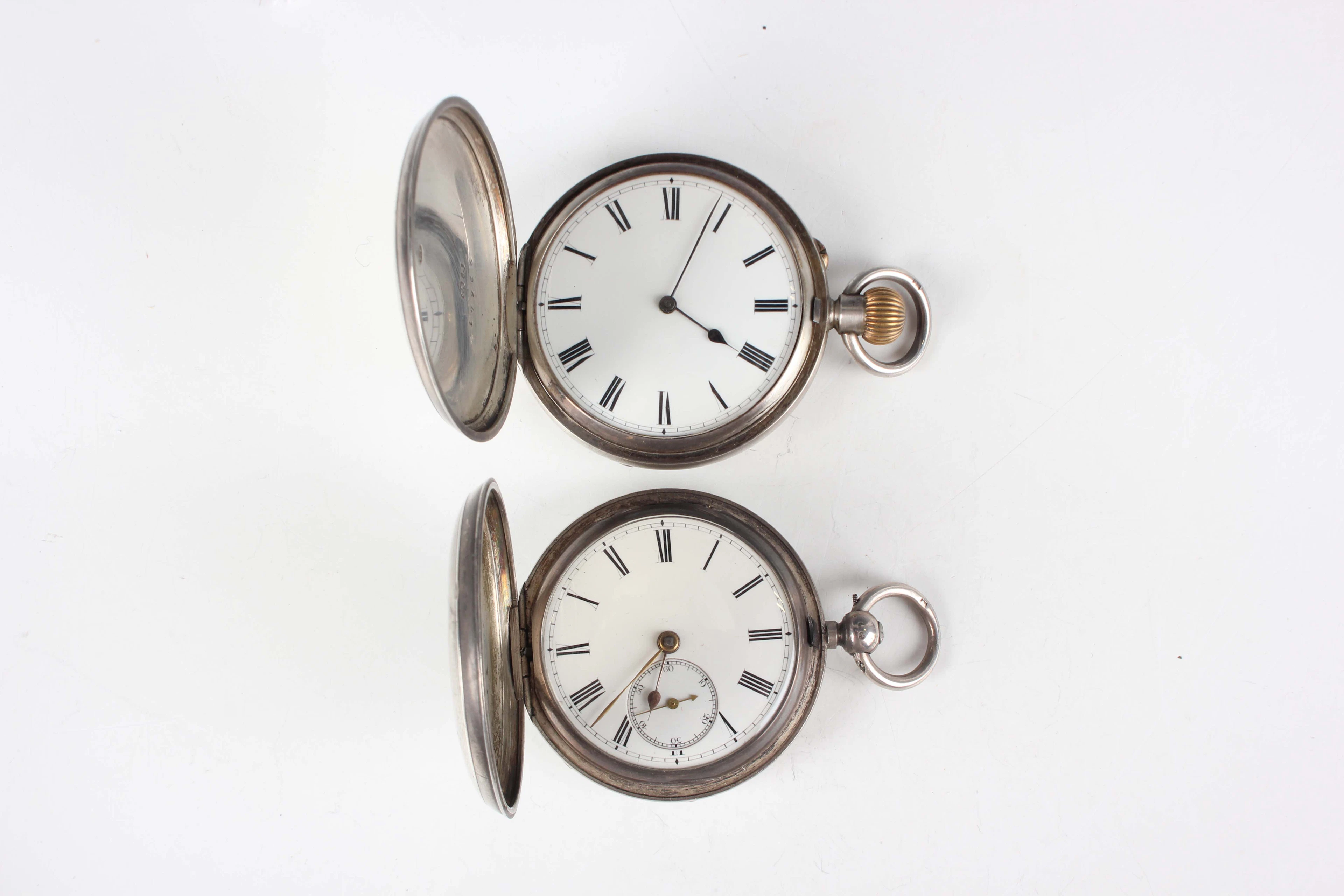 A late Victorian silver hunting cased keyless wind gentleman's pocket