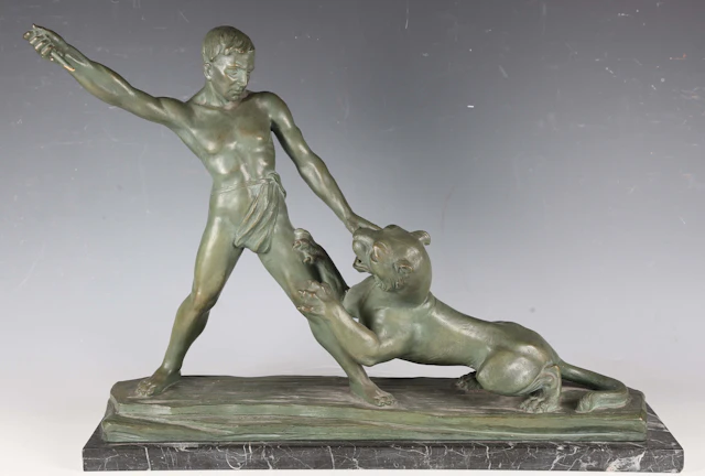 Auguste Henri Carli - an Art Deco green patinated plaster figure of