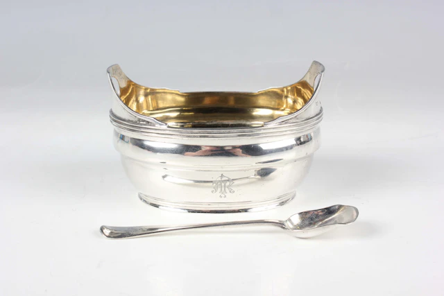 A Victorian silver salt of oval form with reeded rim and upright pierced