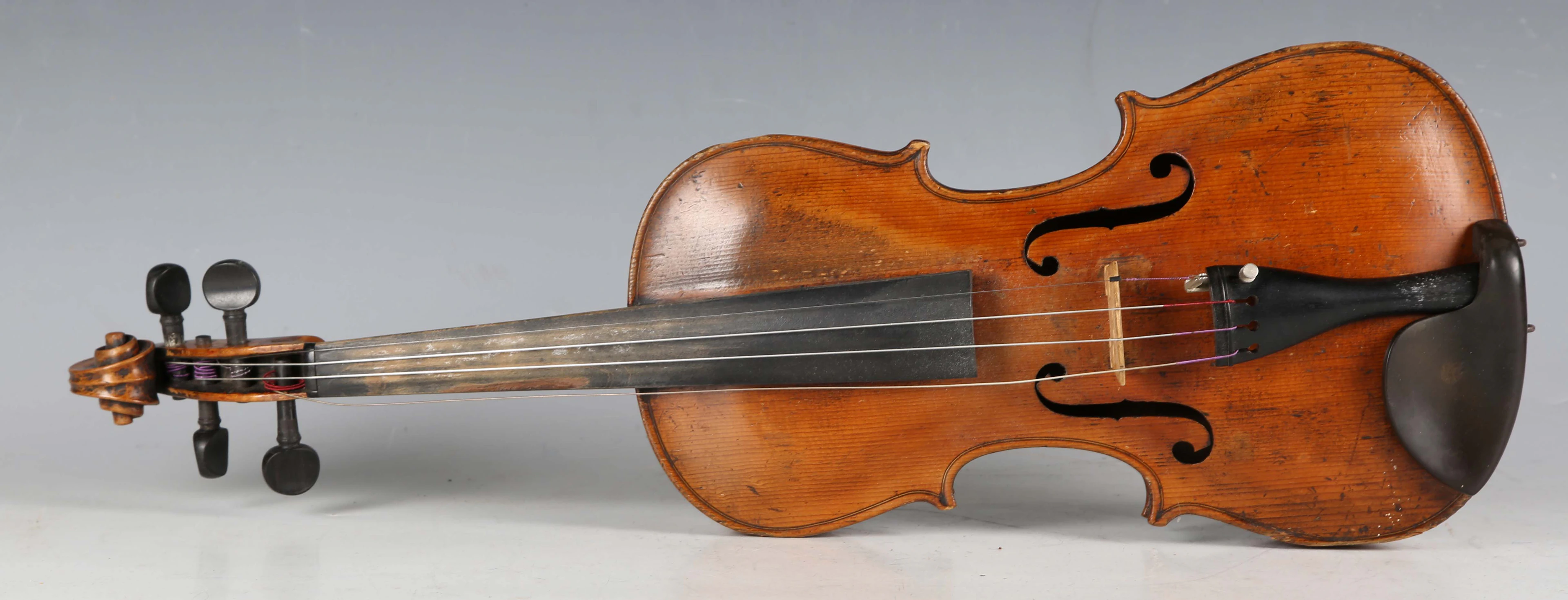 A violin with two-piece back, length of back excluding button 35.3cm