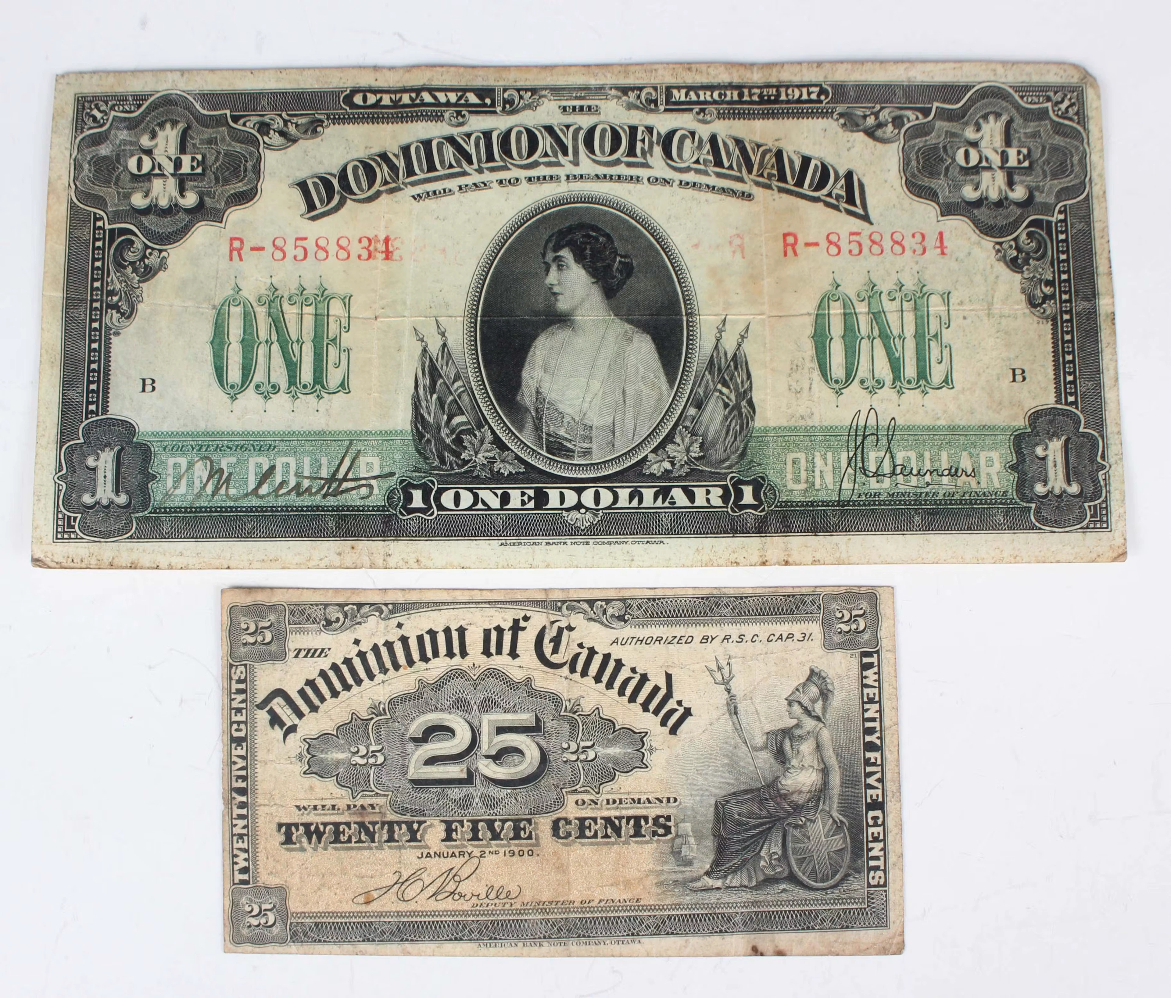 A small group of Canadian banknotes, including a Dominion of Canada