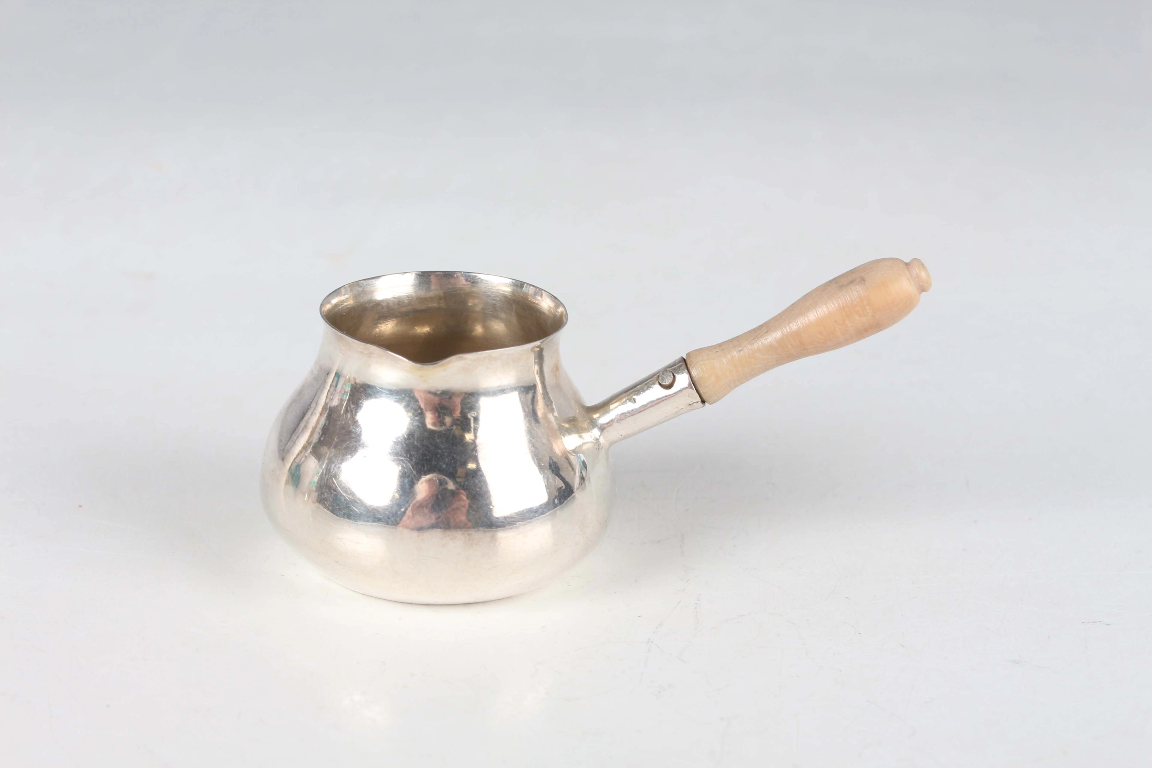 A George II miniature toy silver brandy pan of circular bombé form