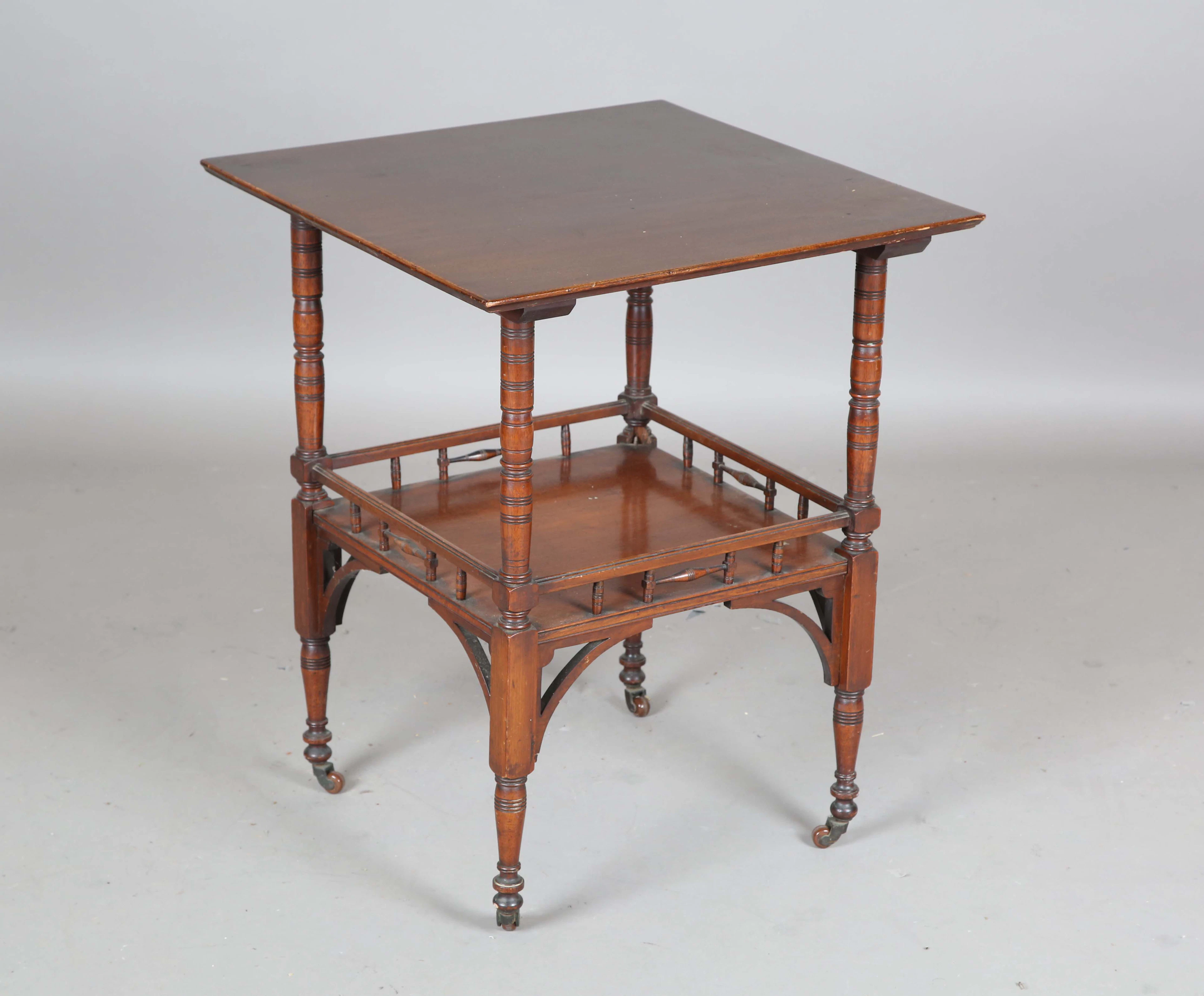 A late Victorian Aesthetic Movement walnut square two-tier occasional