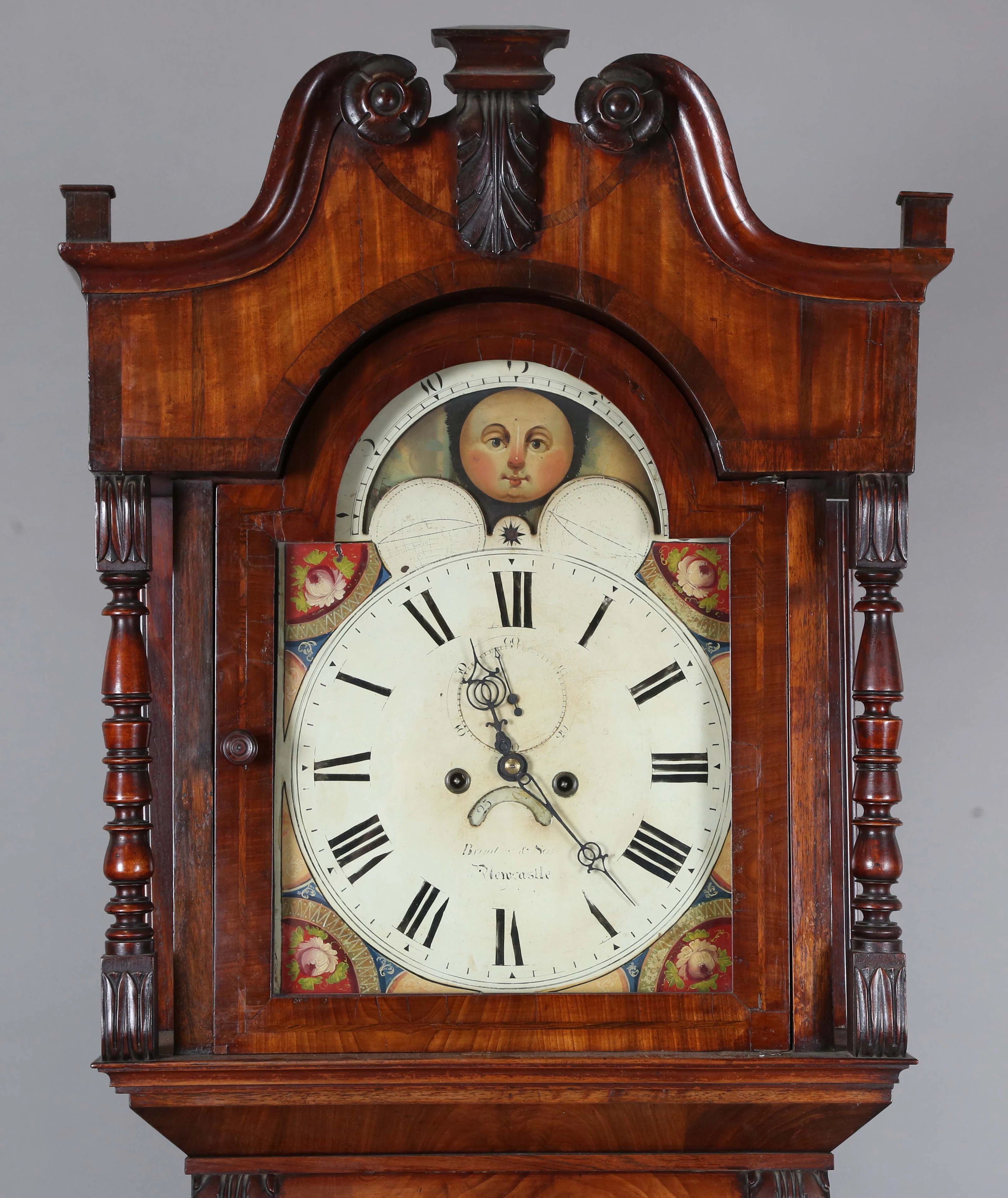 A Victorian mahogany longcase clock with eight day movement striking