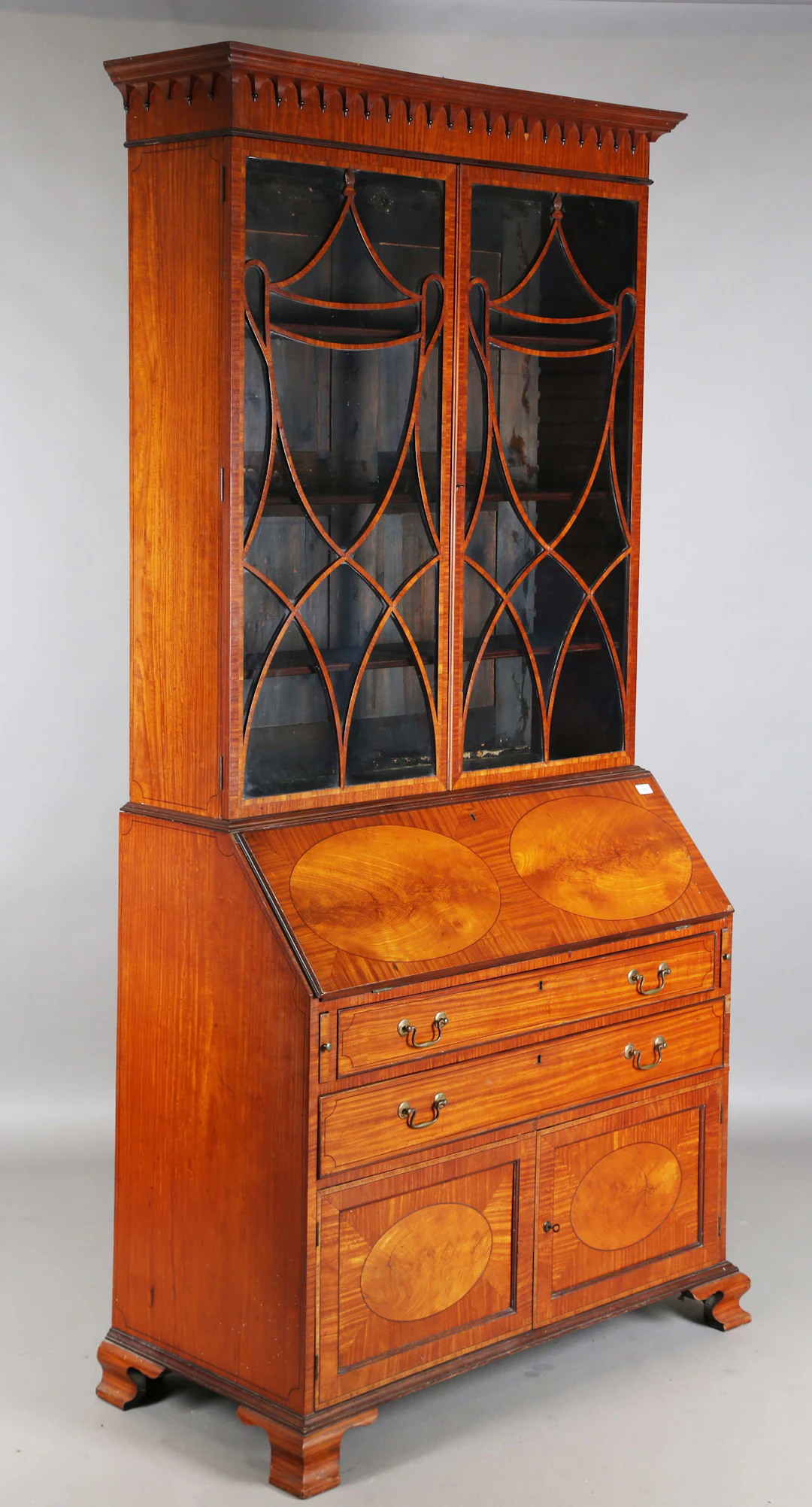 A good Edwardian Neoclassical Revival satinwood bureau bookcase, the