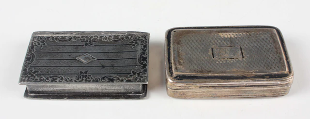 A George IV silver rectangular snuff box with engine turned decoration