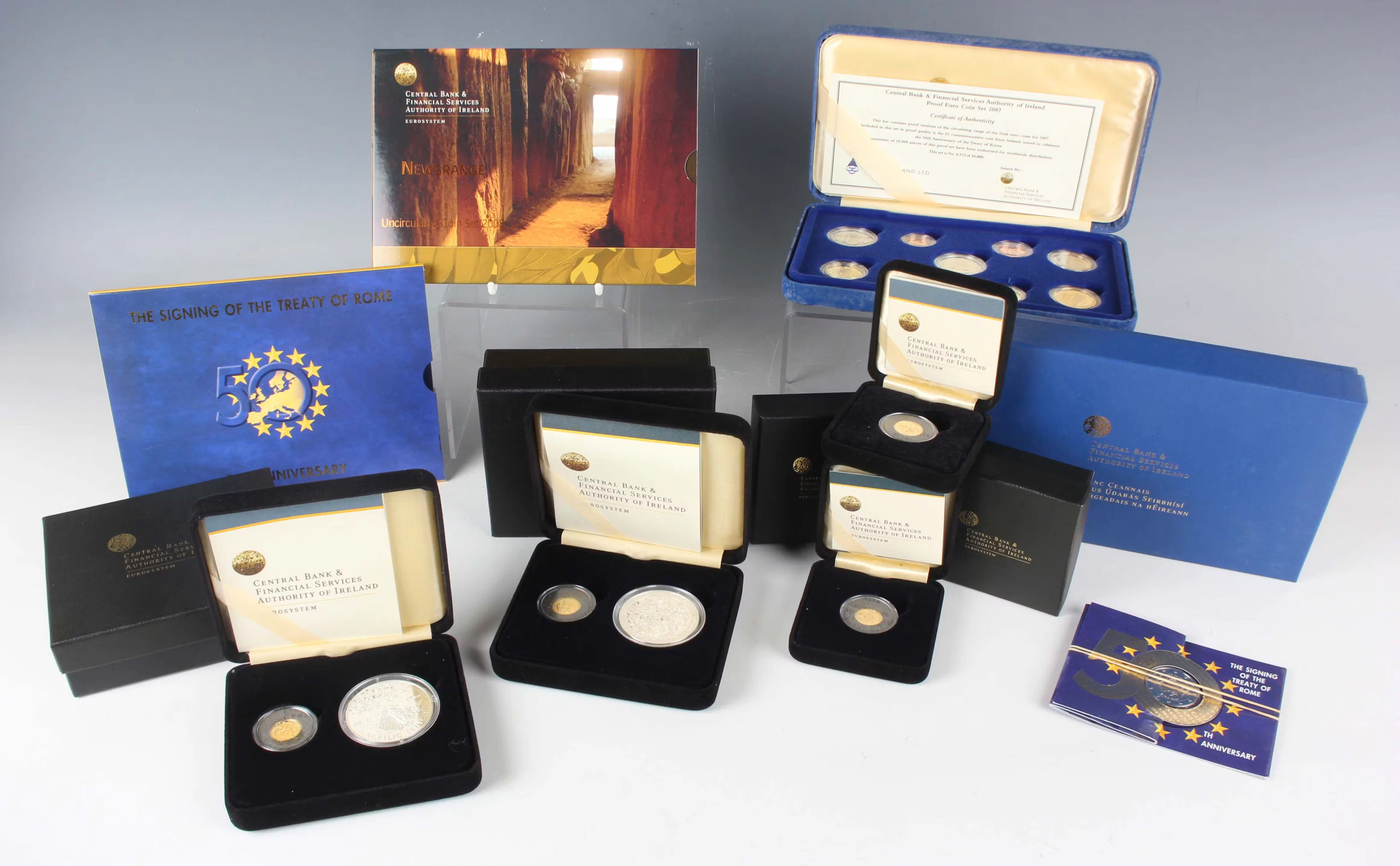 A small collection of commemorative coinage, including a group of