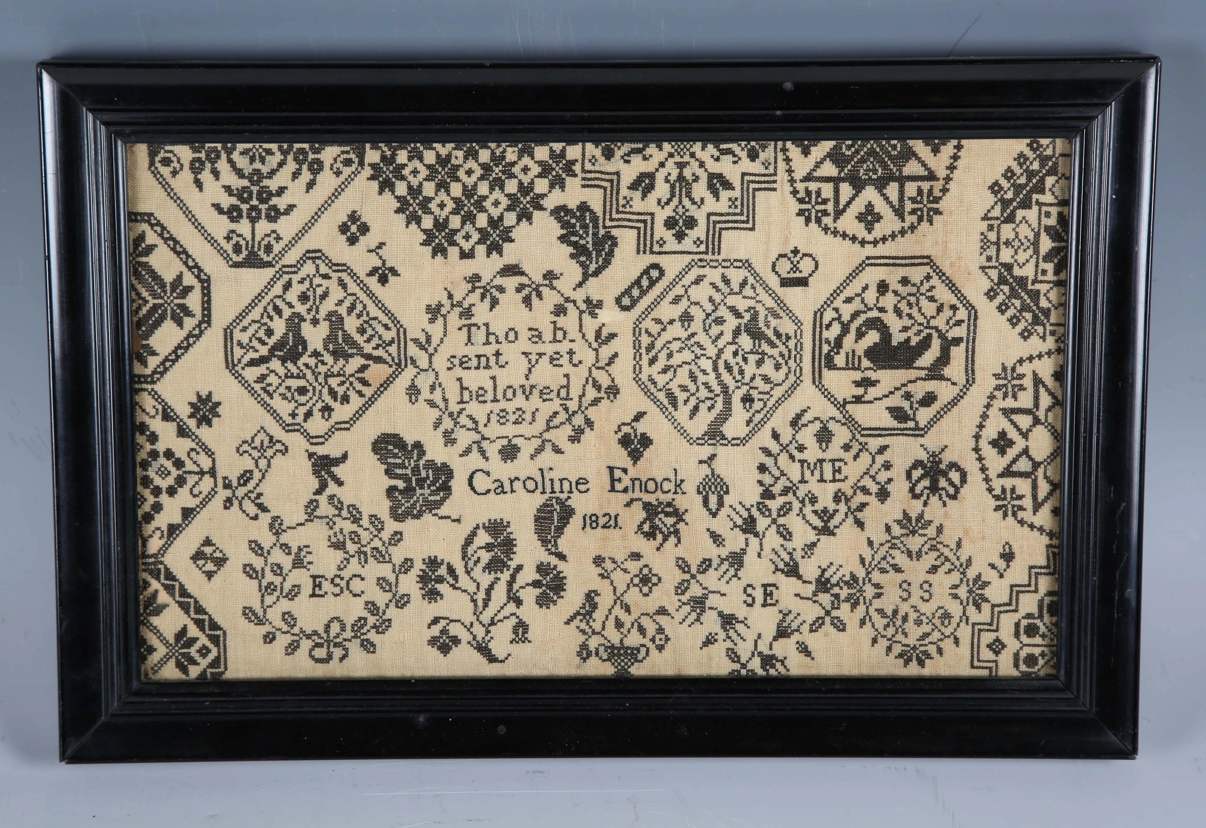 A Regency monochrome needlework sampler by Caroline Enock, dated 1821