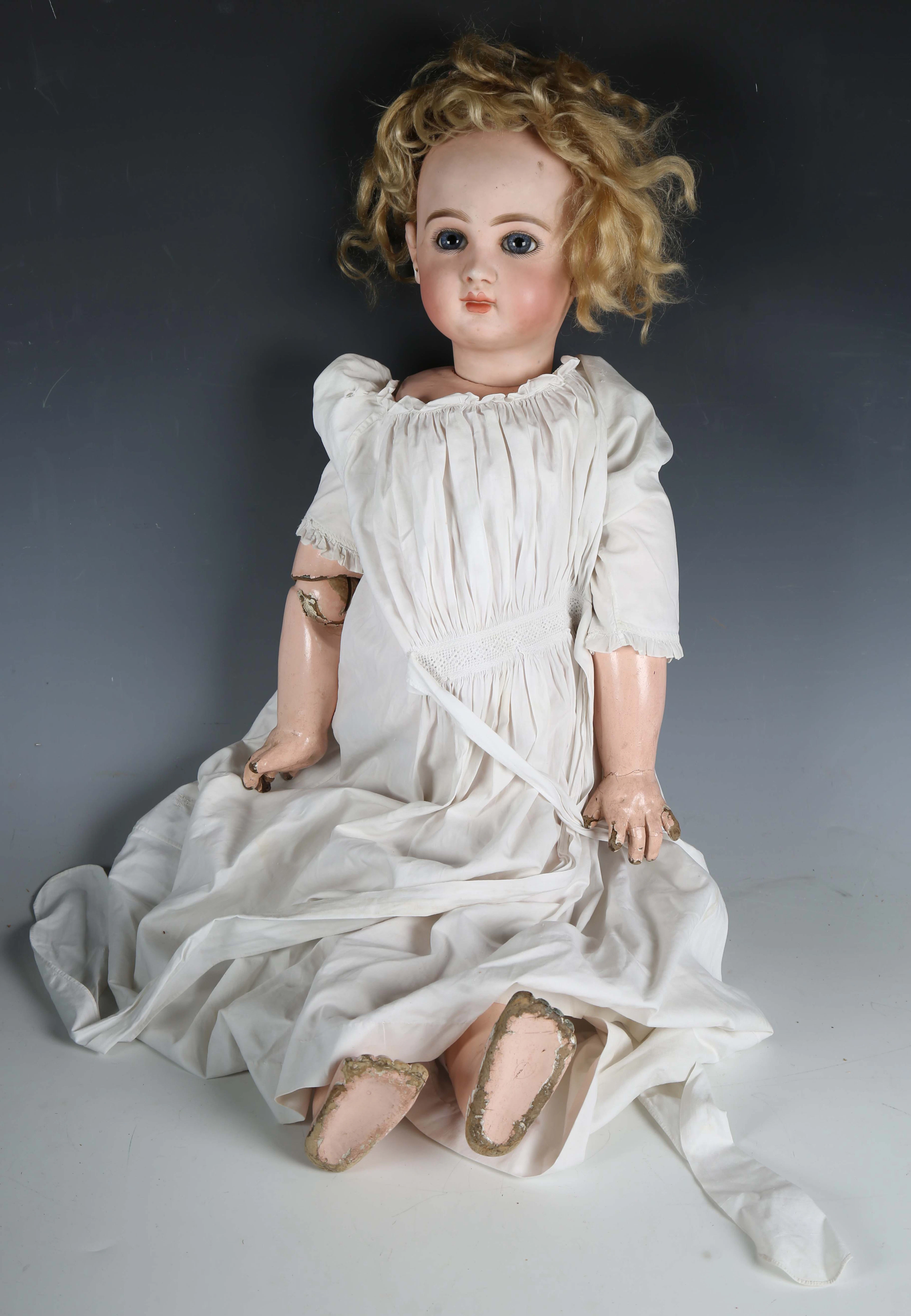 A Jumeau bisque head doll with voice box, the head marked ’12 VL?’
