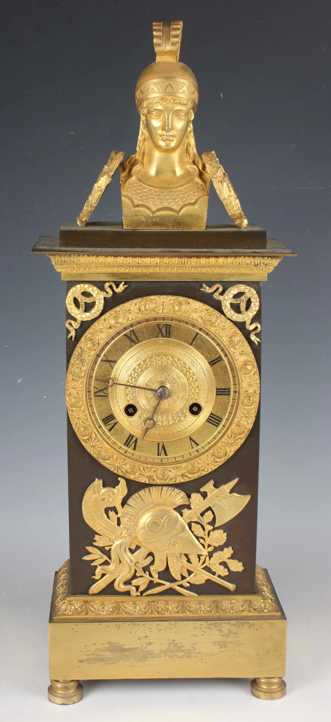 An early 19th century French ormolu and brown patinated bronze mantel