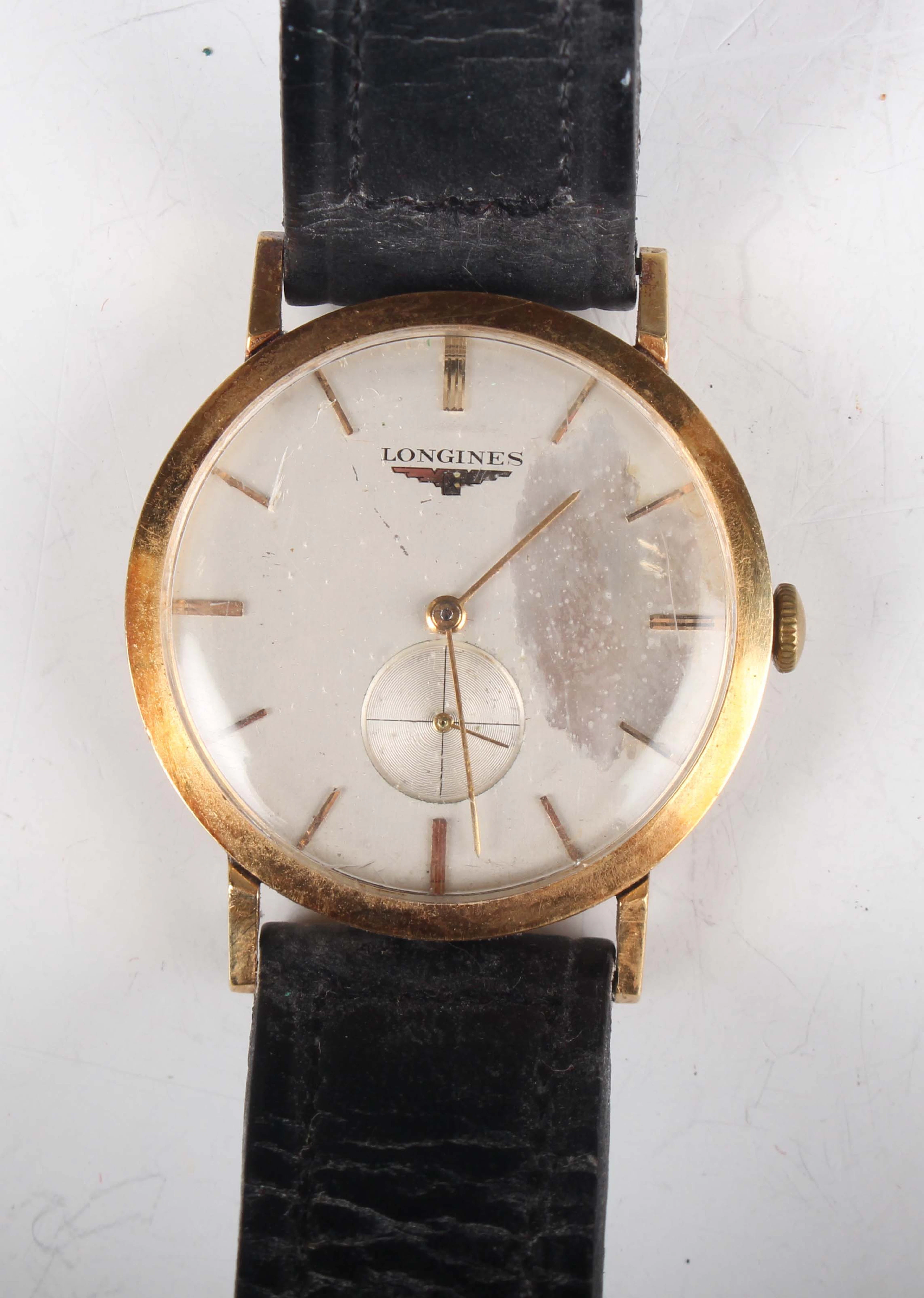 A Longines 18ct gold circular cased gentleman's wristwatch, the signed