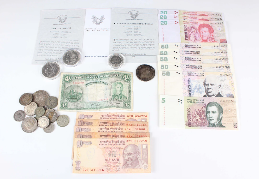 A small collection of antique and later coins and banknotes, including