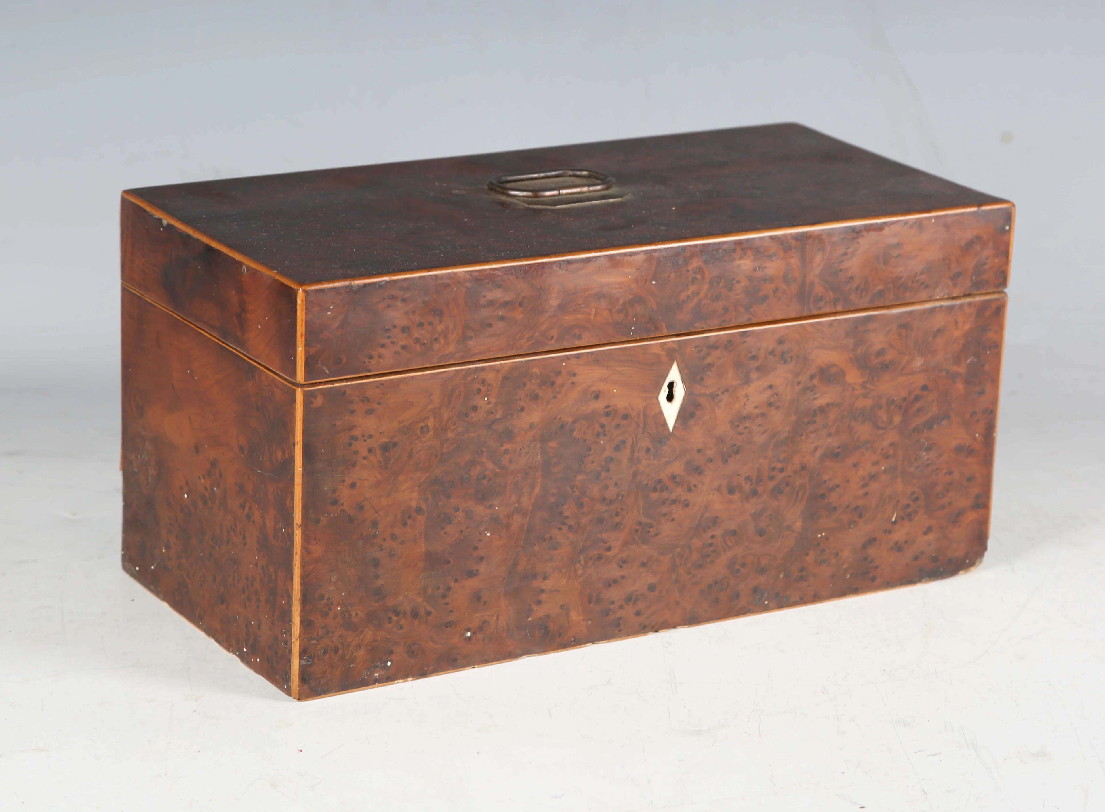 A George III yew wood tea caddy of rectangular form, width 31cm. Provenance: