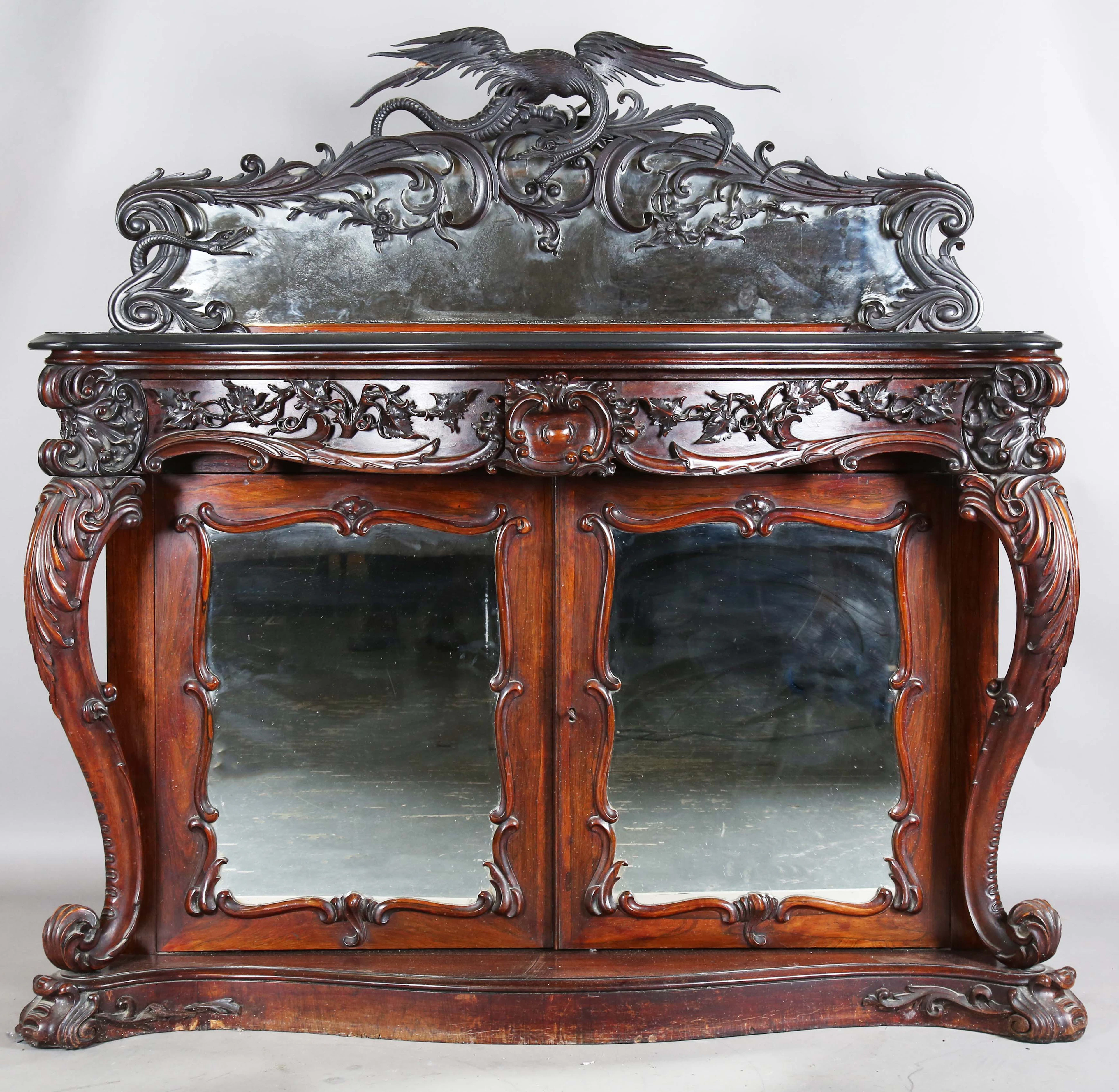 An impressive early Victorian rosewood marble-topped side cabinet
