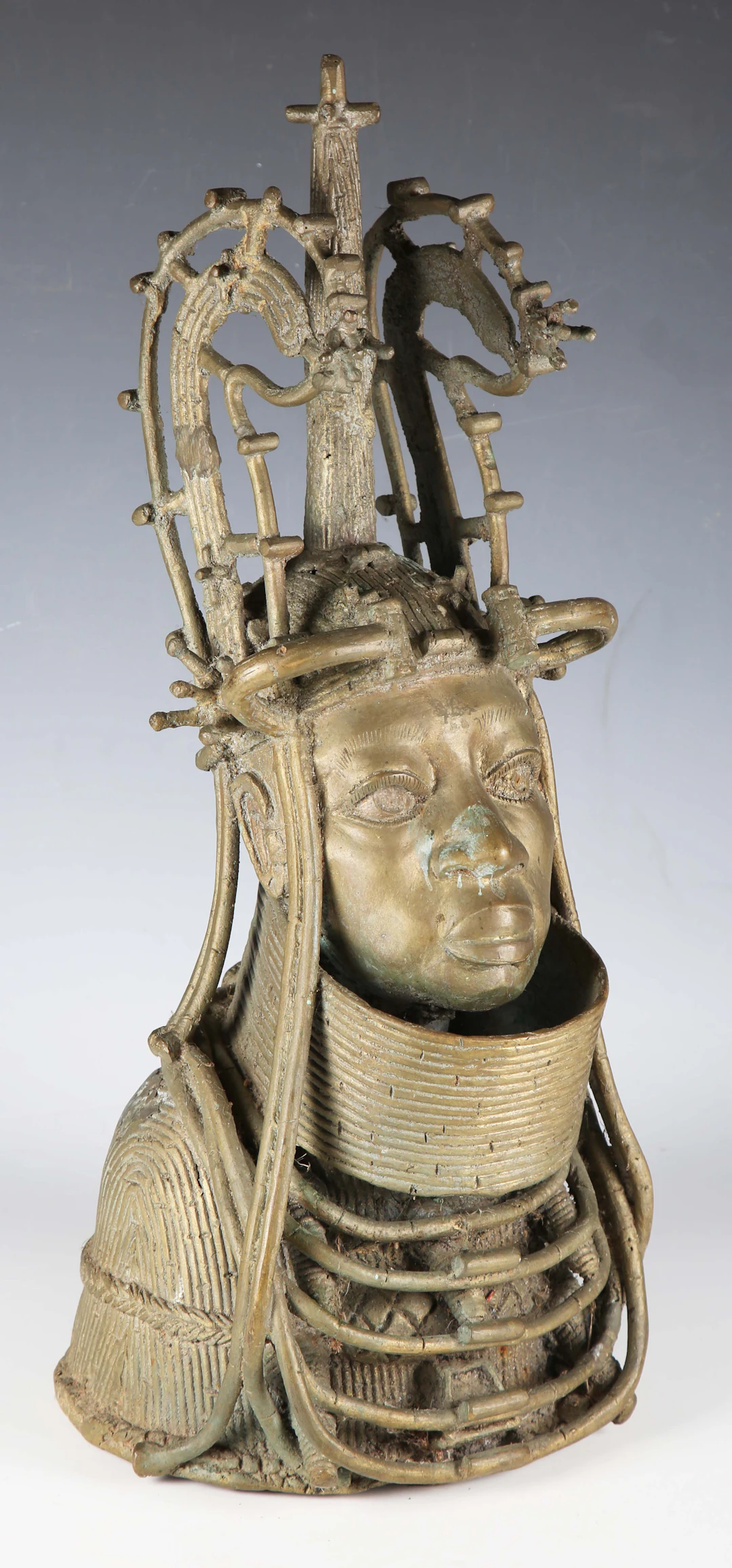 An African Benin style brass portrait bust of an Oba, height 51cm.