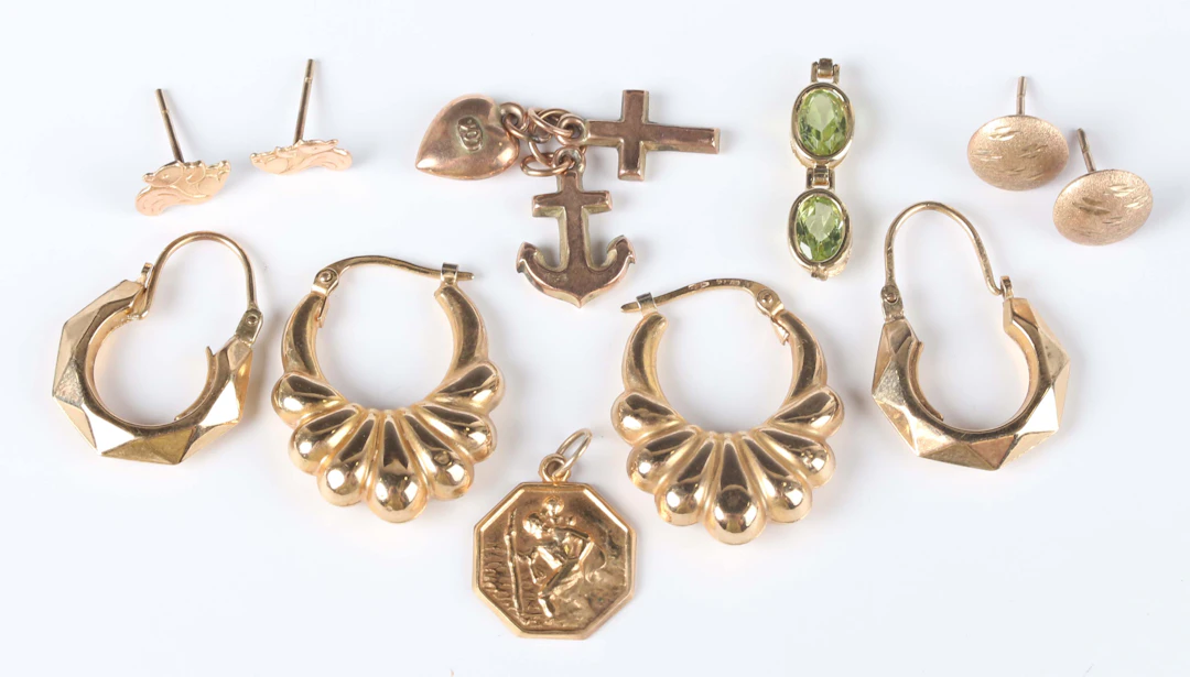 Two pairs of gold hoop shaped earrings, each detailed ‘375’, a Faith