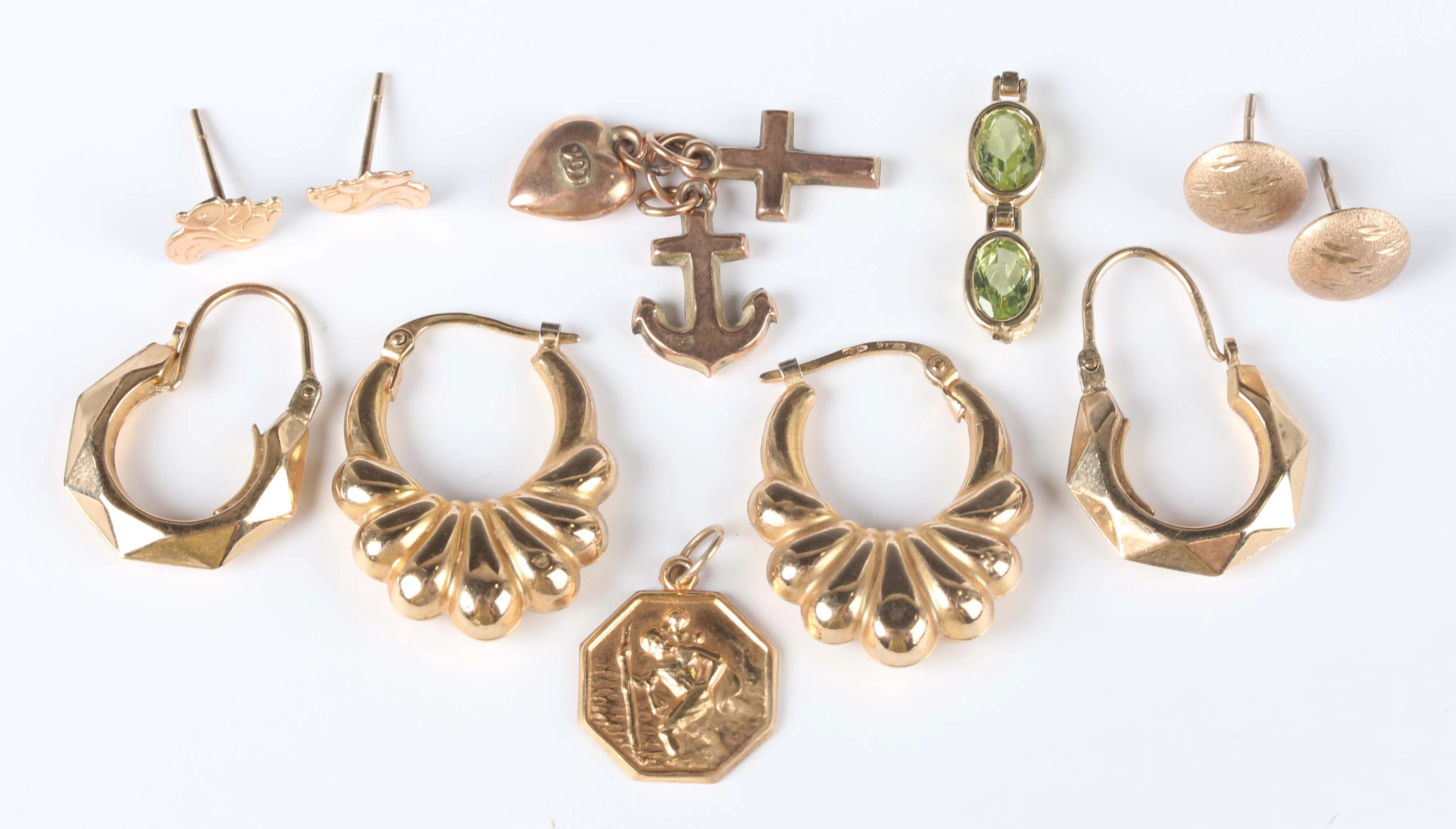 Two pairs of gold hoop shaped earrings, each detailed ‘375’, a Faith
