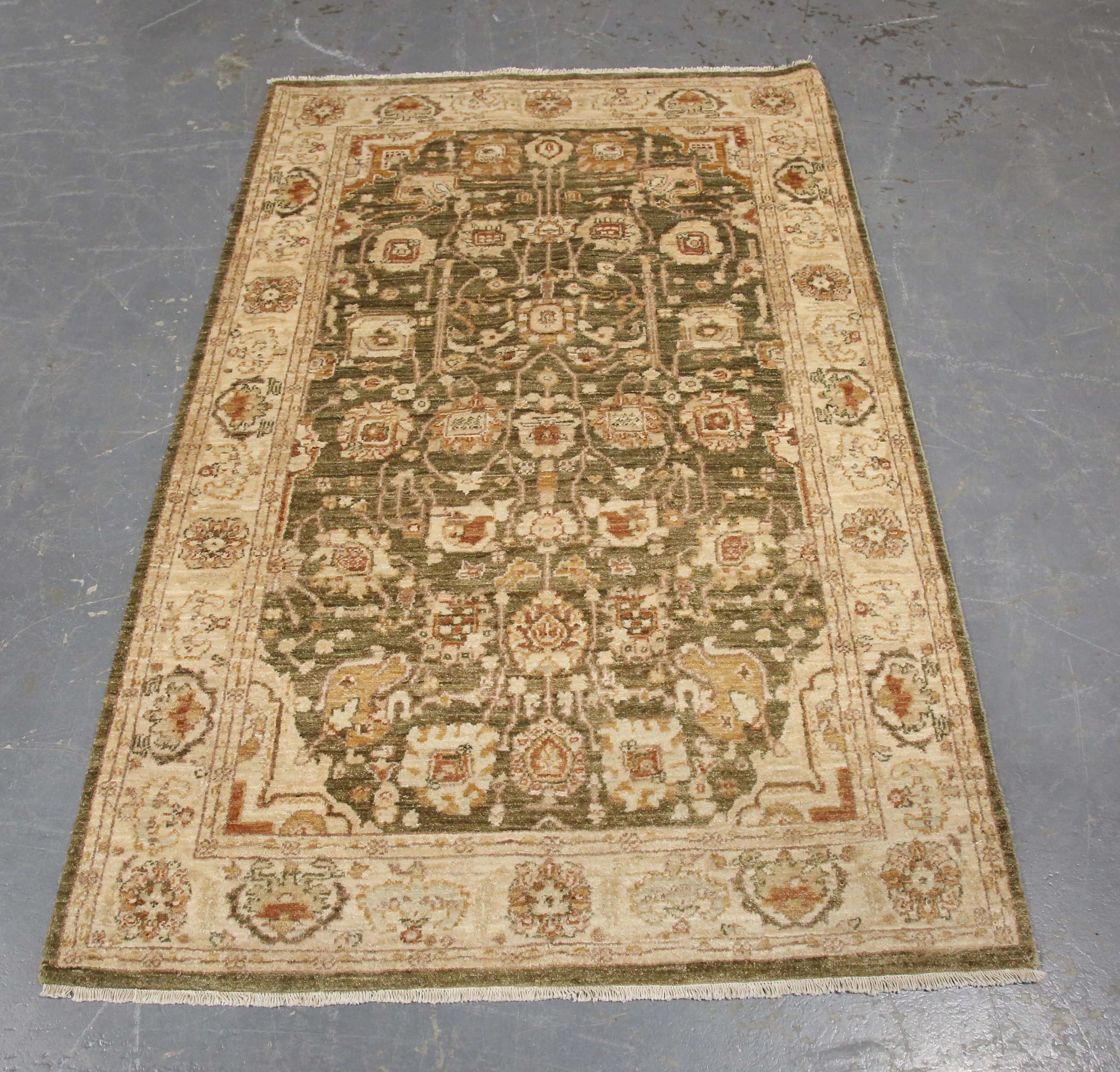 A Pakistan rug, late 20th century, the pale green field with overall