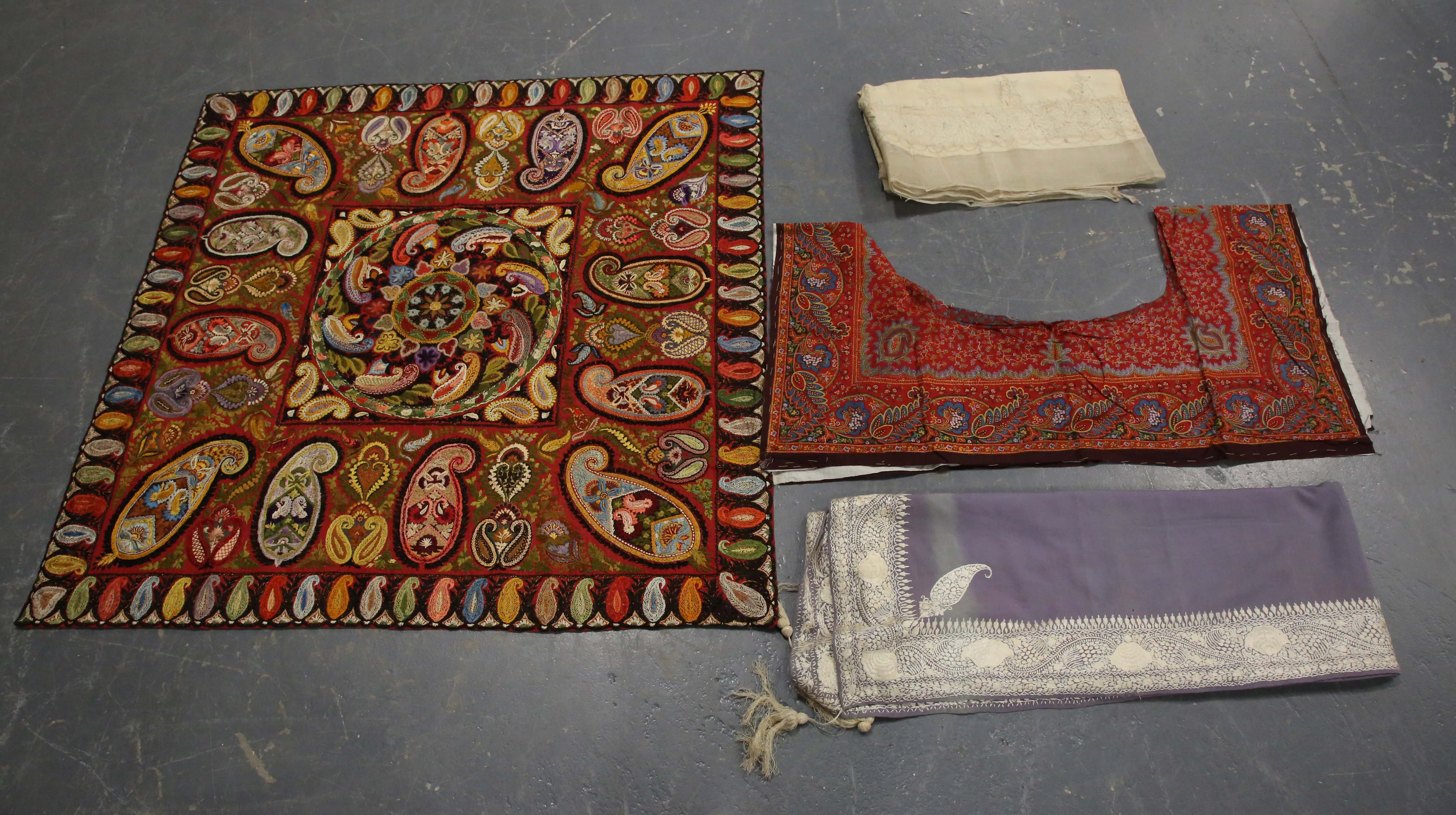 An early 20th century Indian lilac cotton shawl with an ivory silk