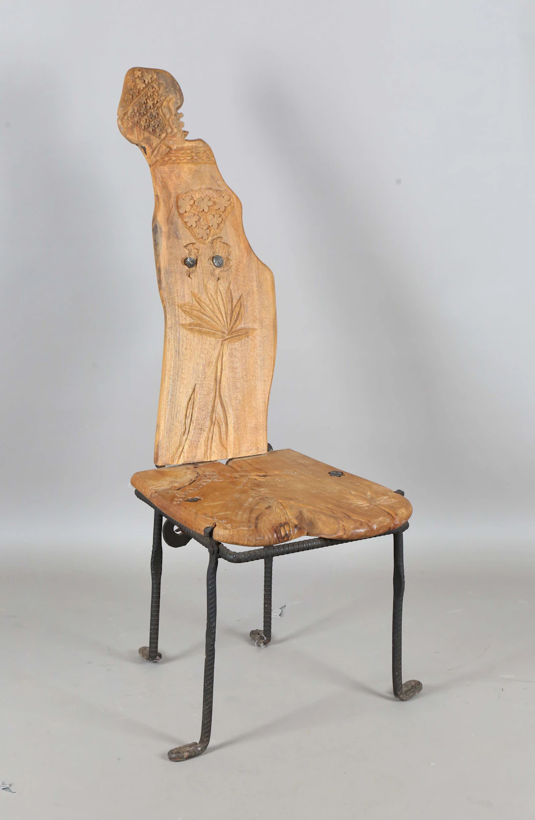 A late 20th century Middle Eastern walnut and wrought iron hall chair
