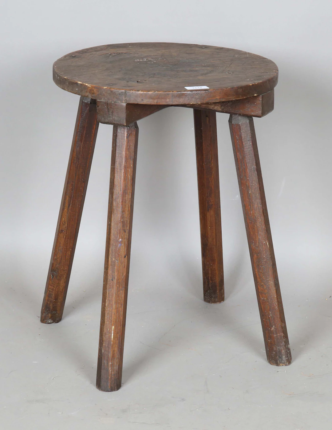 A 19th century provincial ash and softwood circular table with four