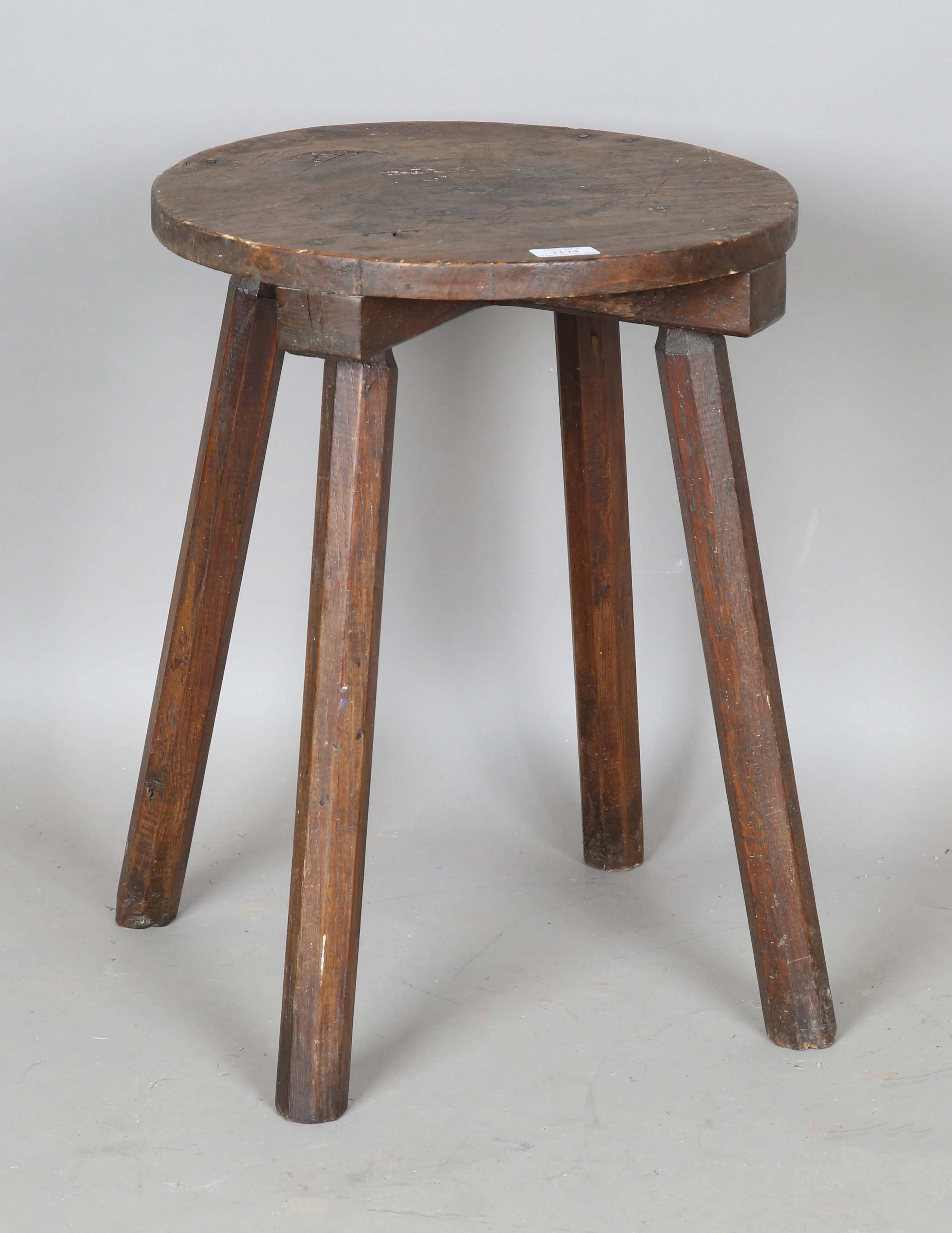 A 19th century provincial ash and softwood circular table with four