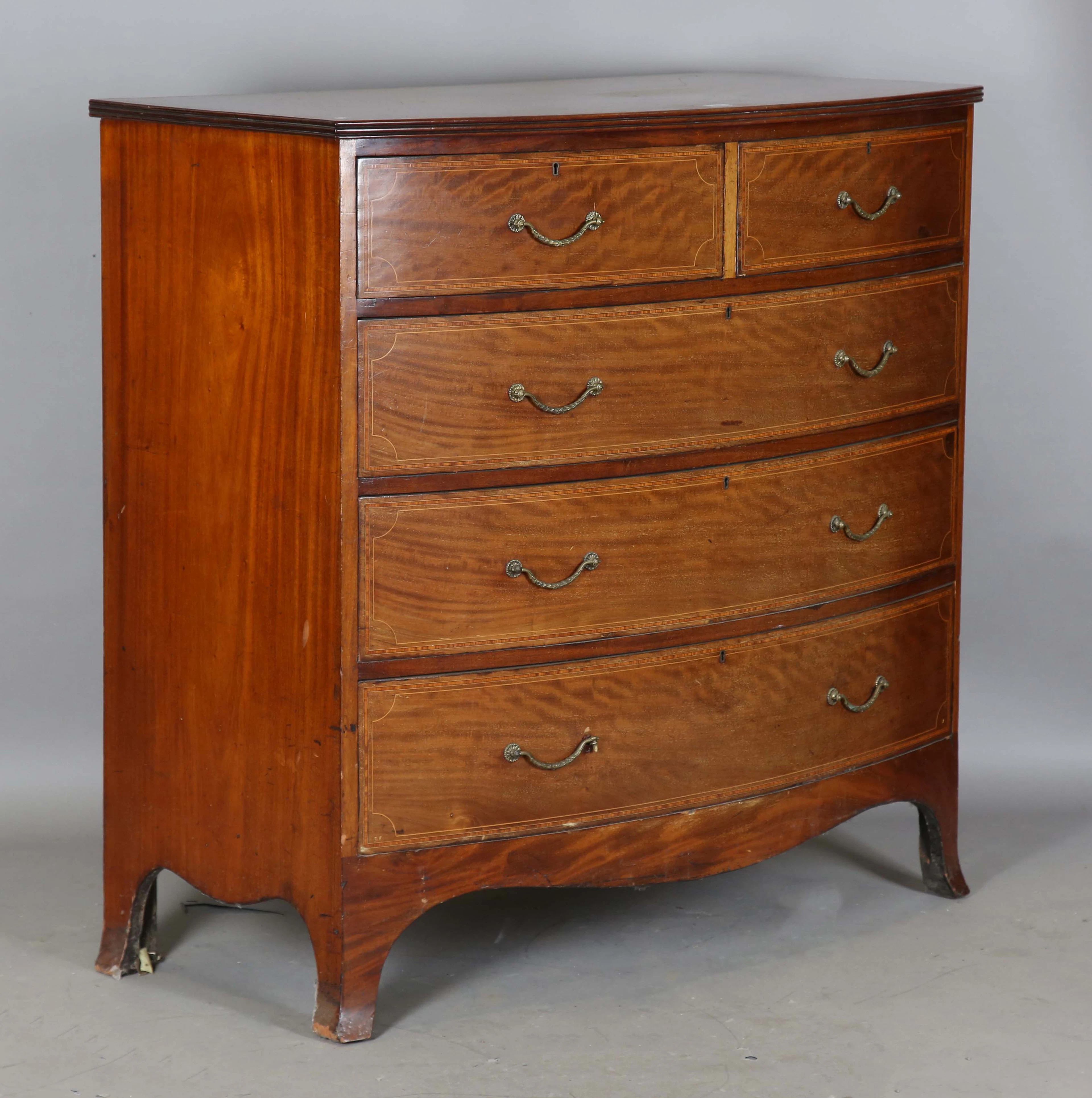 An Edwardian mahogany and satinwood crossbanded bowfront chest of