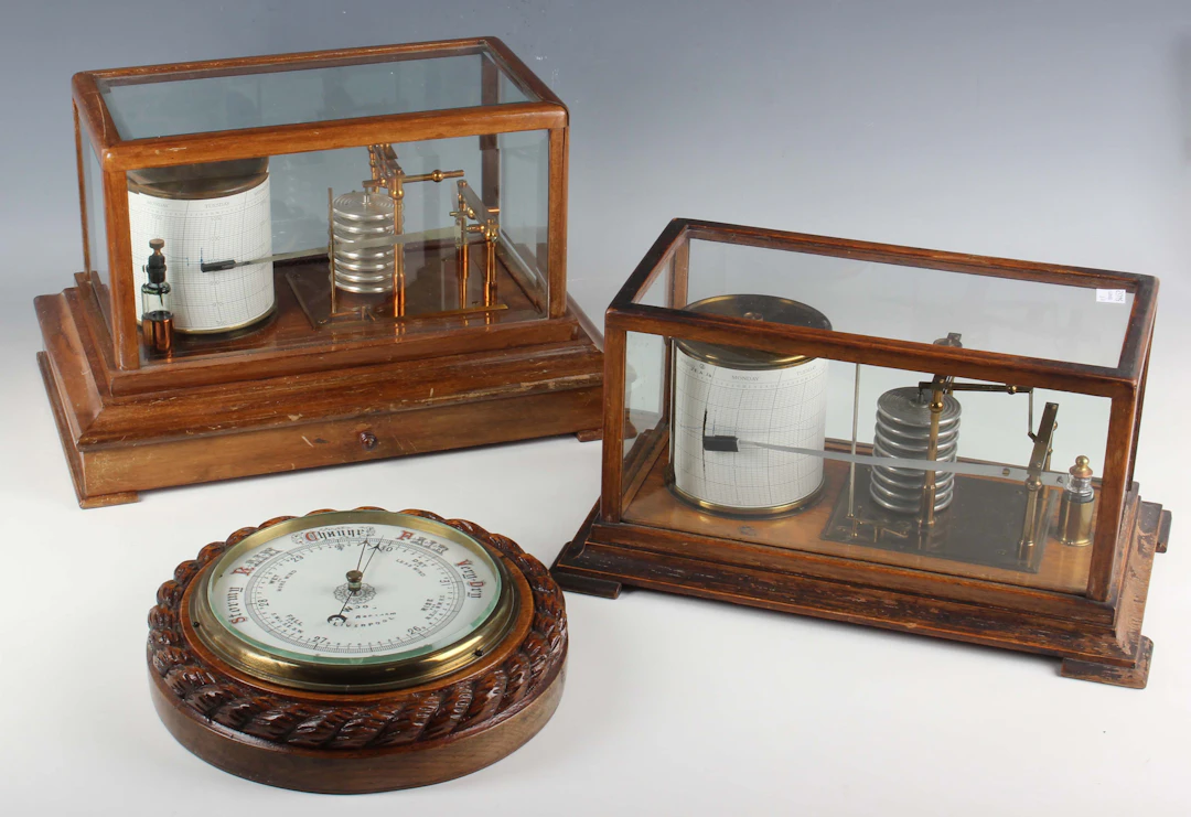 An early 20th century mahogany cased barograph with lacquered brass
