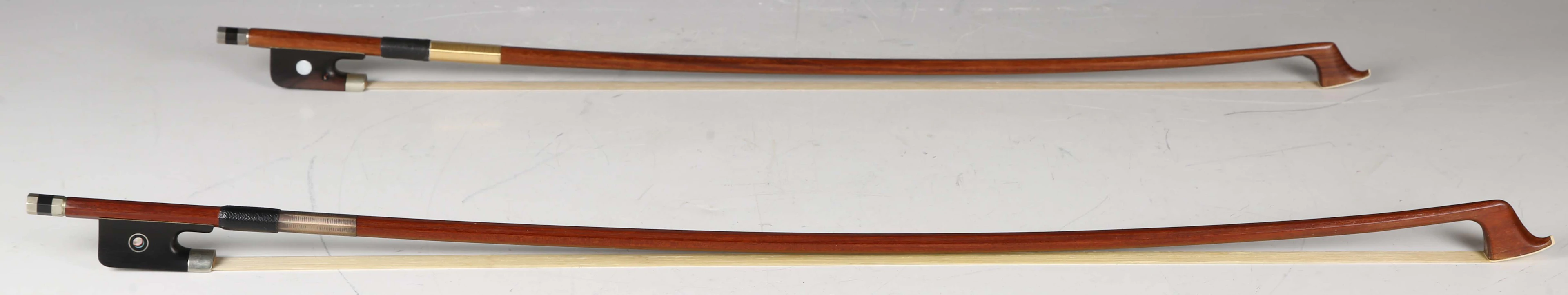 A cello bow with nickel mounts and octagonal shaft, branded 'W.E.