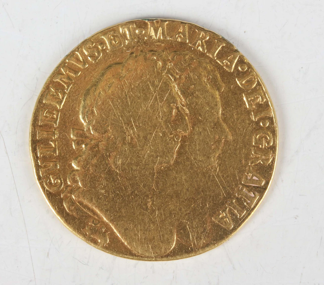 A William and Mary guinea 1689, Sp 3426 (previously mounted, overall
