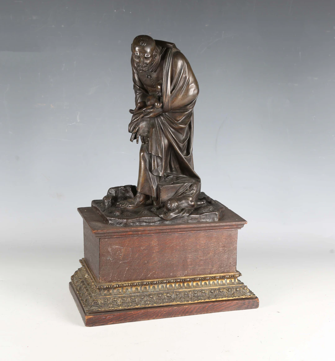 A 19th century Continental brown patinated cast bronze figure of a