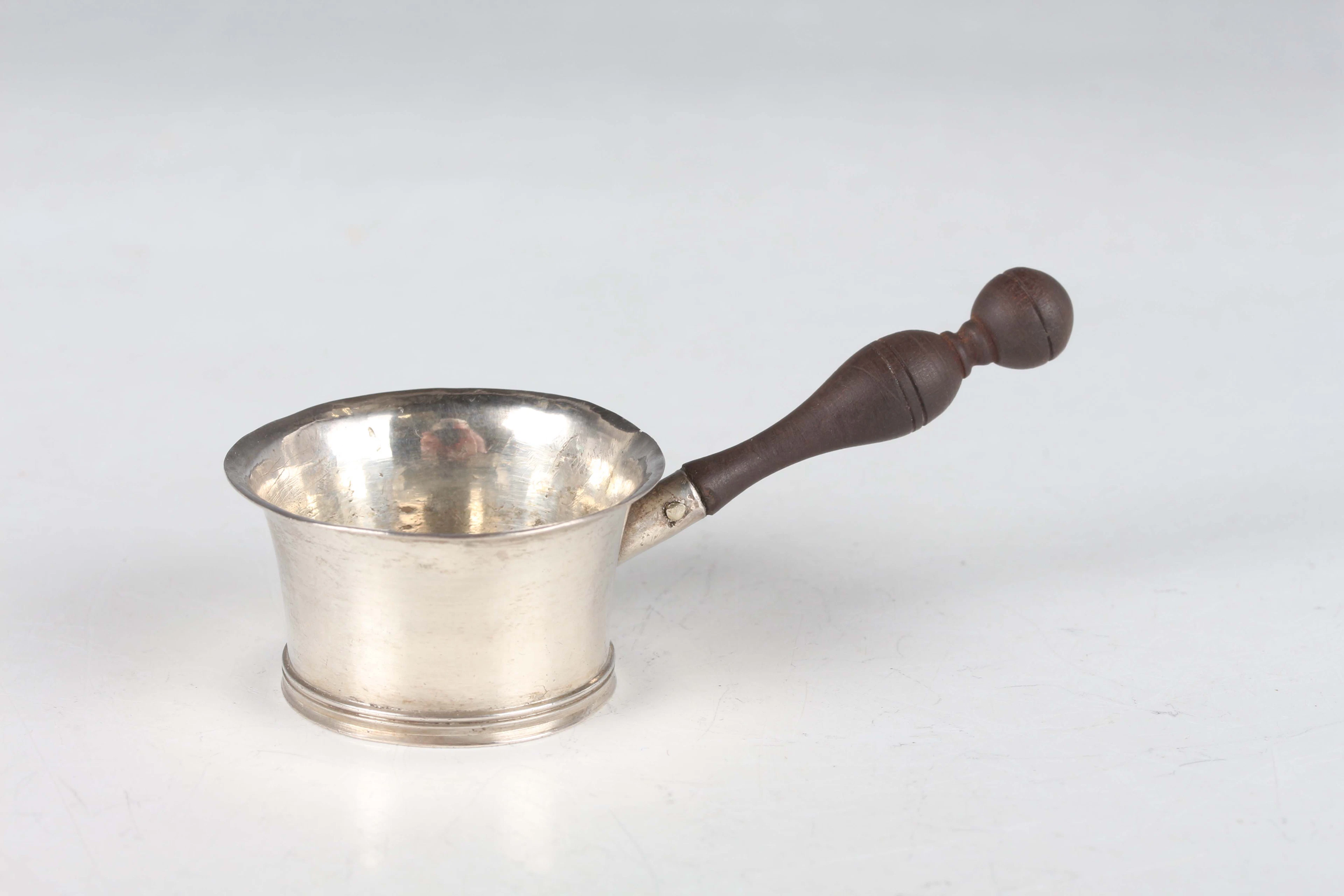 An 18th century miniature toy silver brandy pan of flared circular