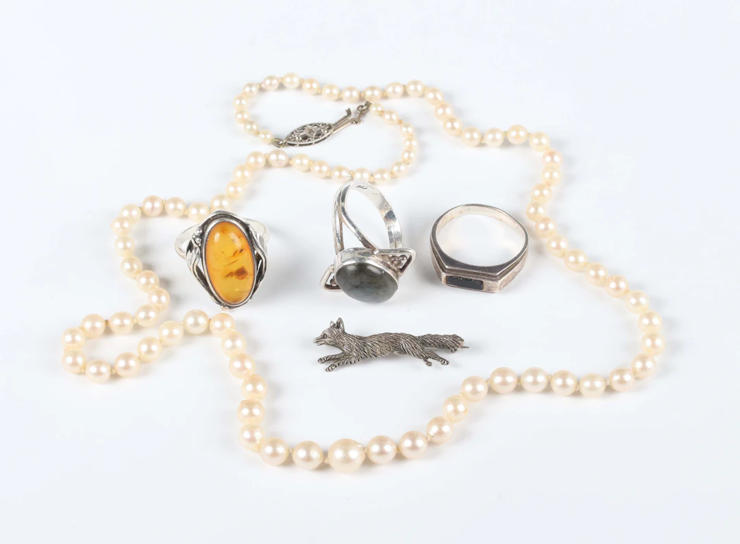 A sterling silver brooch, designed as a running fox, detailed ‘Sterling’