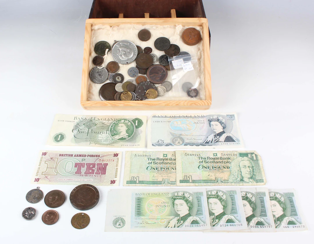 A collection of European and world coins, banknotes and paranumismatic