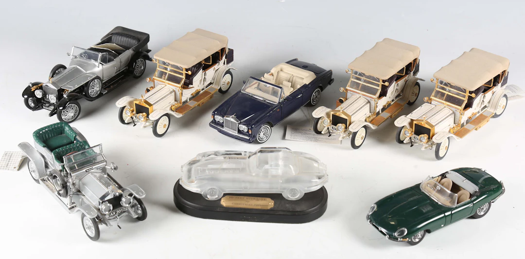 Seven Franklin Mint 1:24 scale model cars, comprising 1925 Rolls-Royce