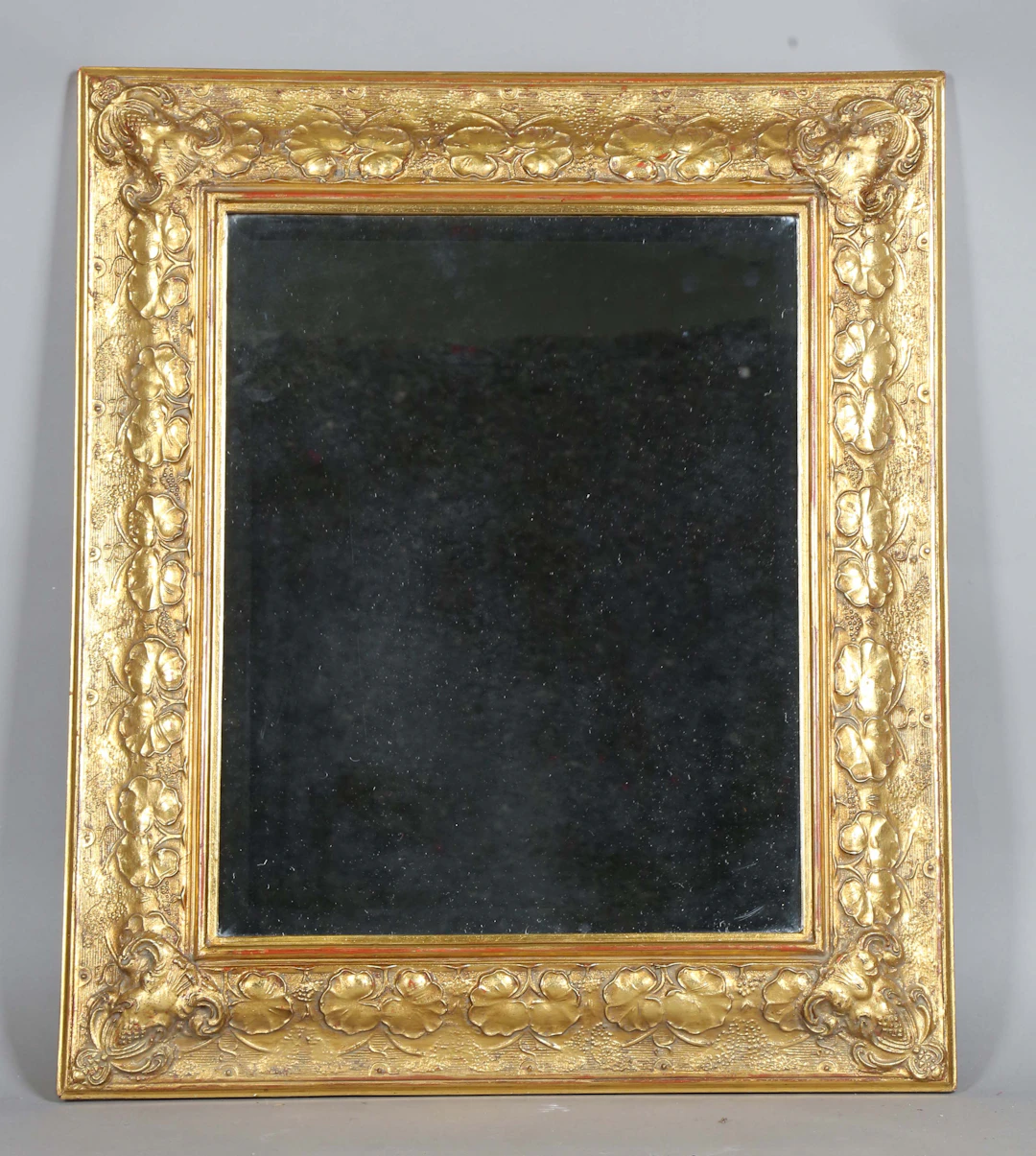 A late 20th century gilt composition rectangular wall mirror, the
