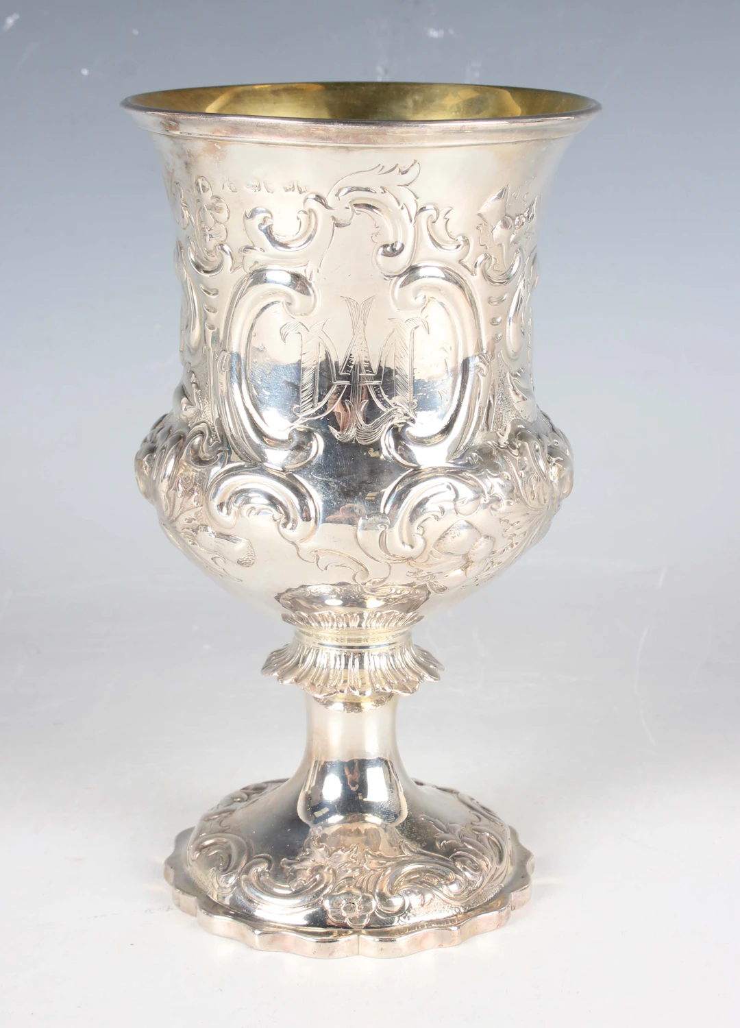 An early Victorian silver goblet, the urn shaped bowl monogram engraved