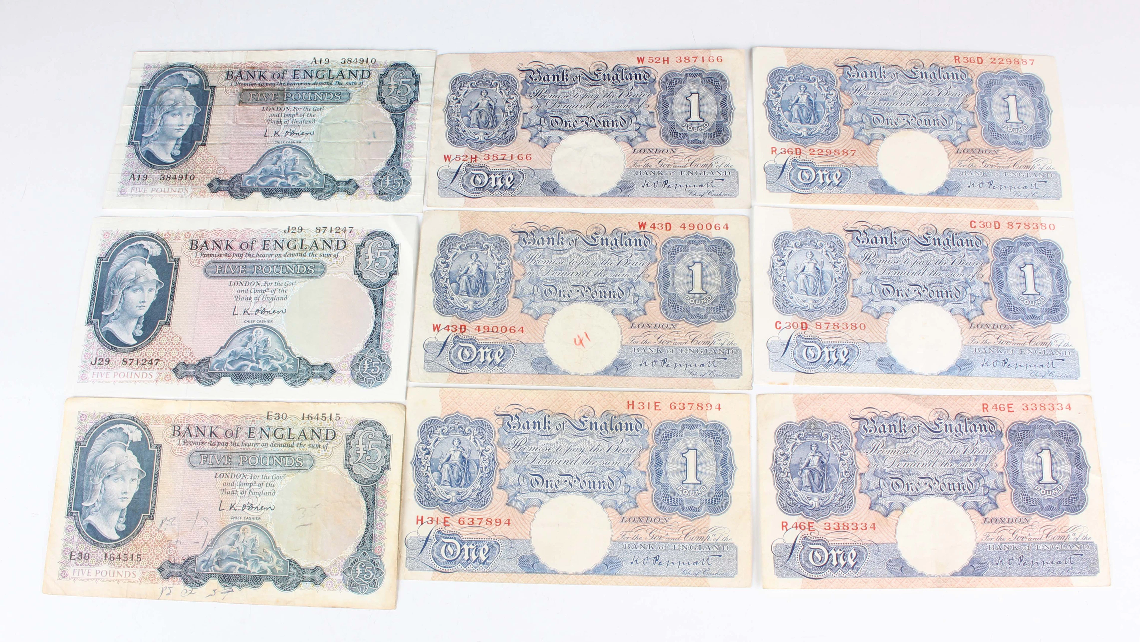 A large collection of British banknotes, including twenty pounds