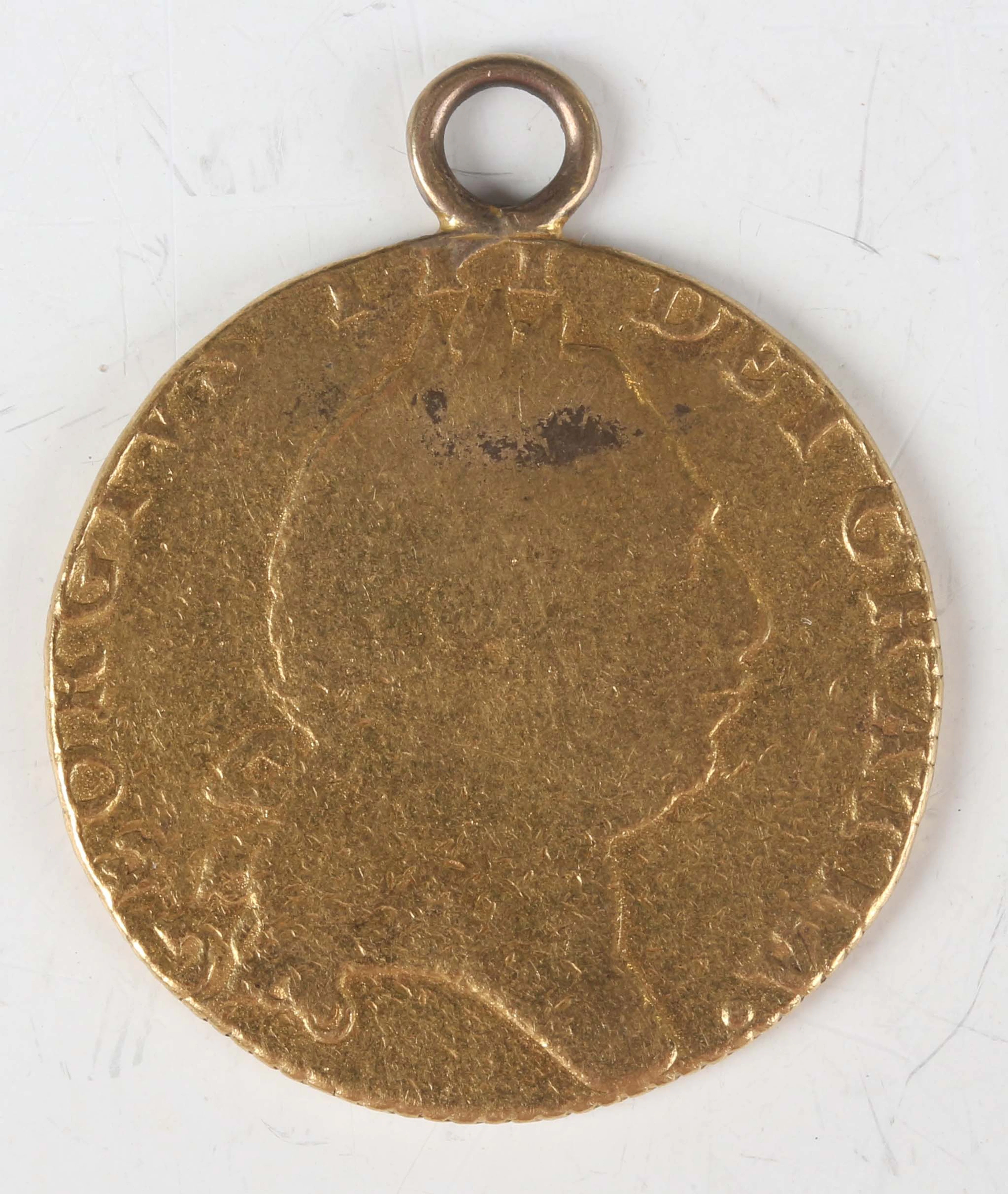 A George III guinea 1795 with loop pendant mount.