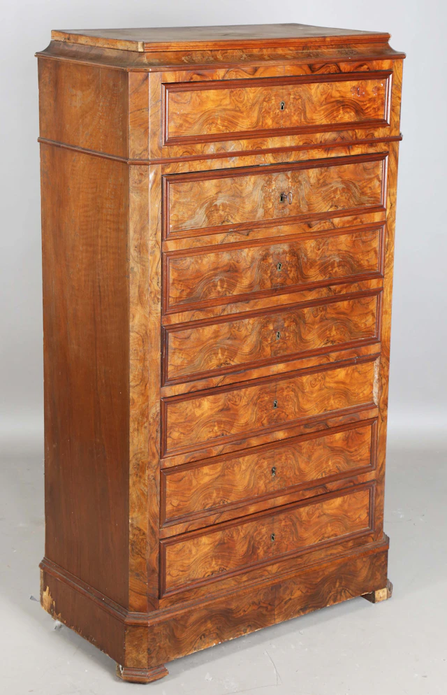 A French Louis Philippe burr walnut escritoire, fitted with four oak-lined