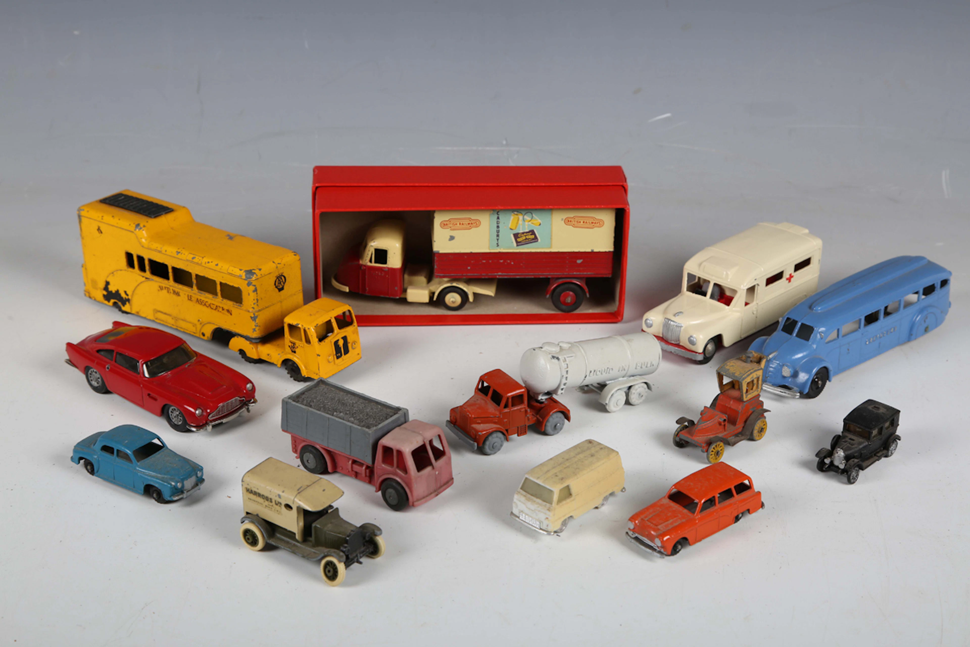A small group of diecast vehicles, including Budgie 'Jumbo' AA articulated