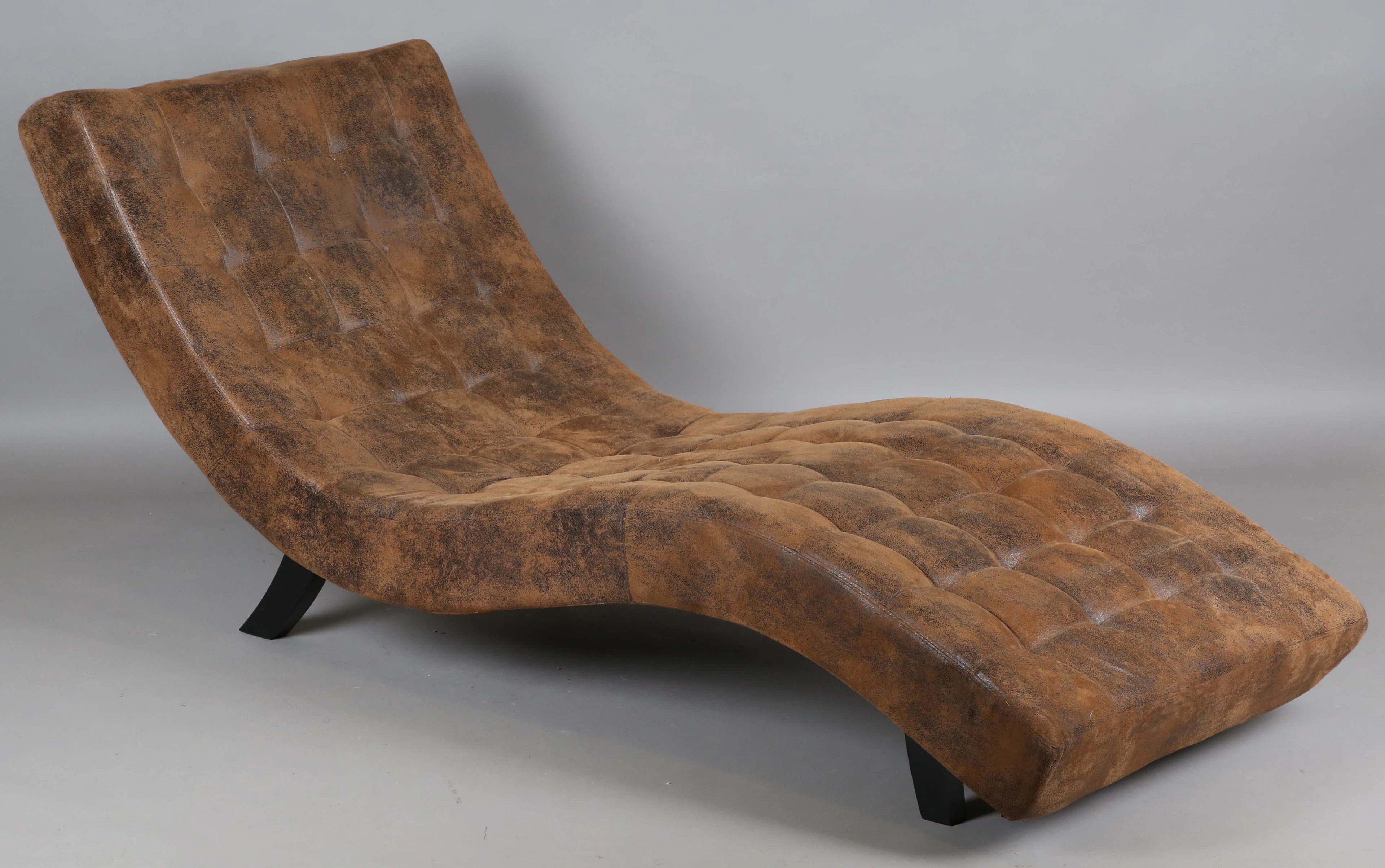 A modern brown leather chaise longue by Kare Design, height 83cm