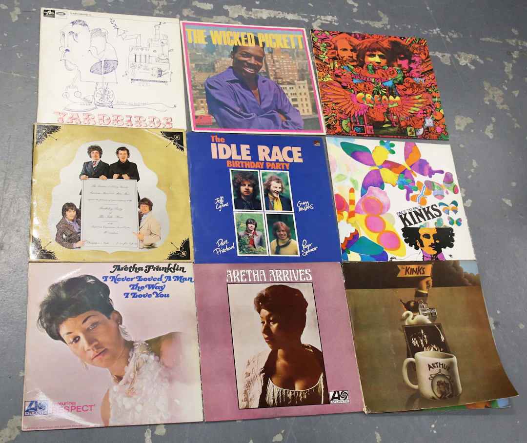 A collection of approximately fifty-two LP records, including a first